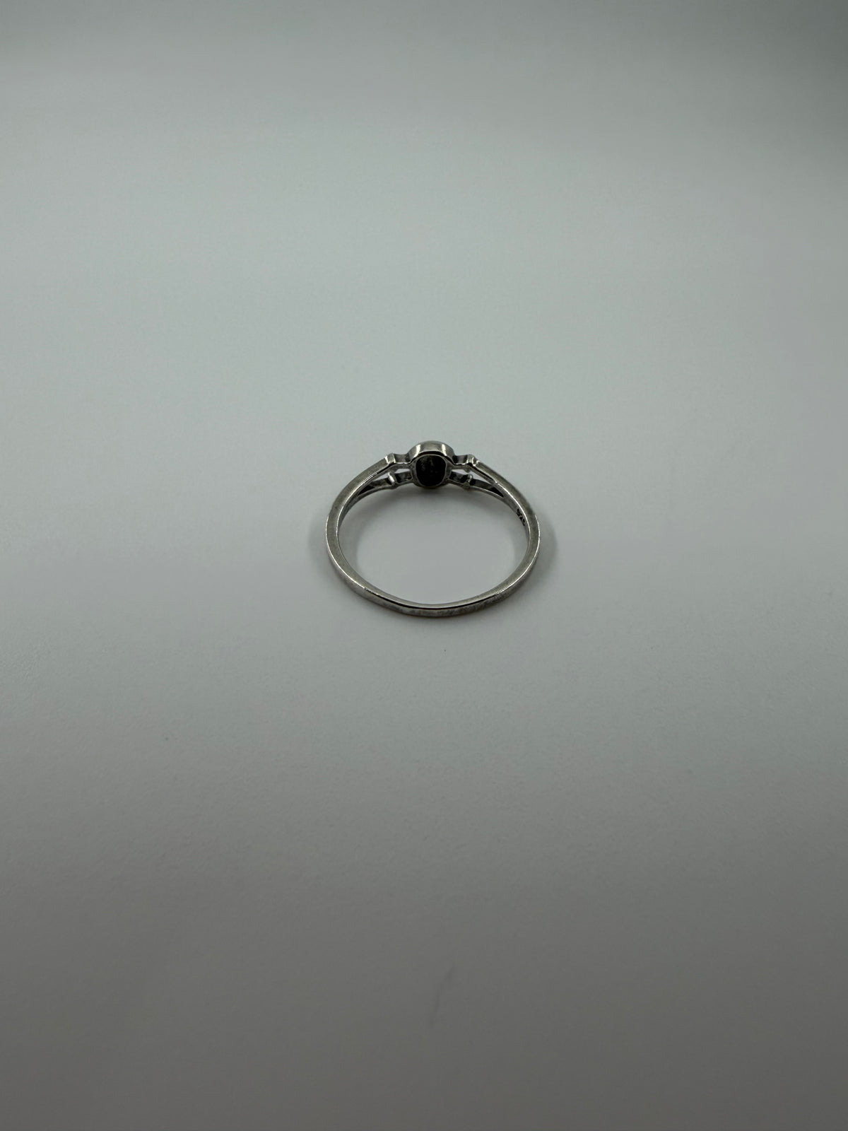 TINY SKULL AND CROSSBONES STERLING SILVER RING