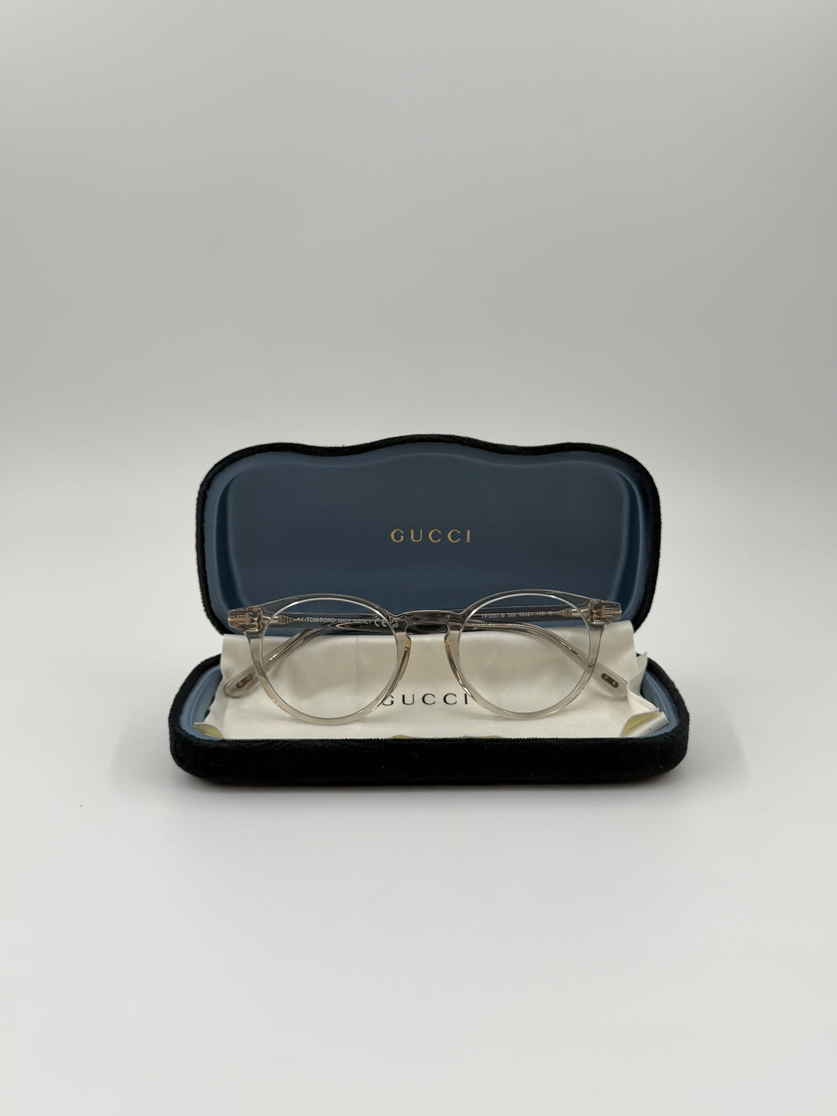 TOM FORD TF5557-B CLEAR ROUNDED FRAME GLASSES