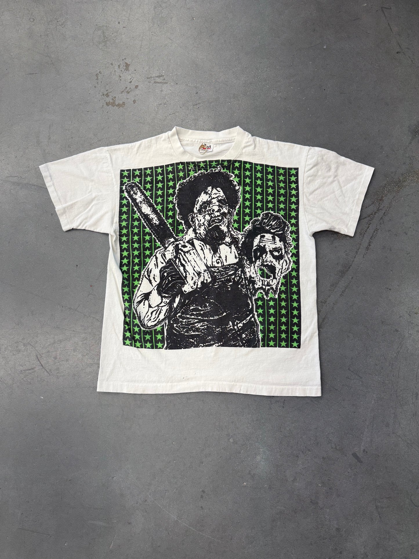 TEXAS CHAINSAW MASSACRE ED GEIN GREEN STARS JUMBO PRINT TEE (ANVIL TAG)