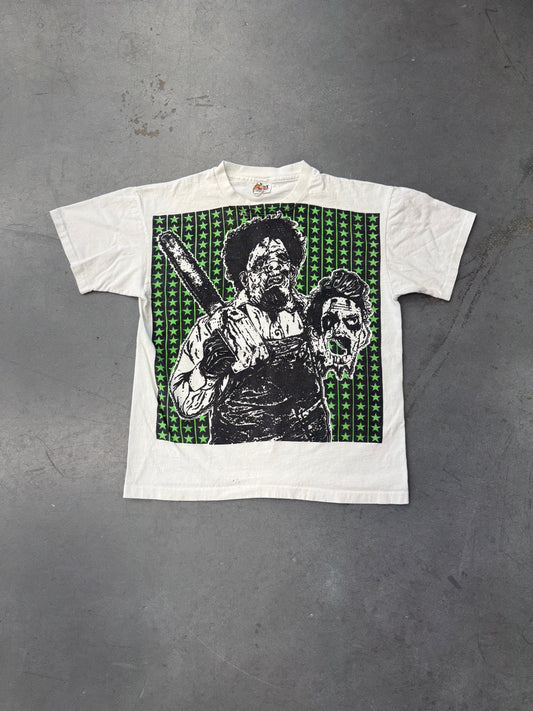 TEXAS CHAINSAW MASSACRE ED GEIN GREEN STARS JUMBO PRINT TEE (ANVIL TAG)