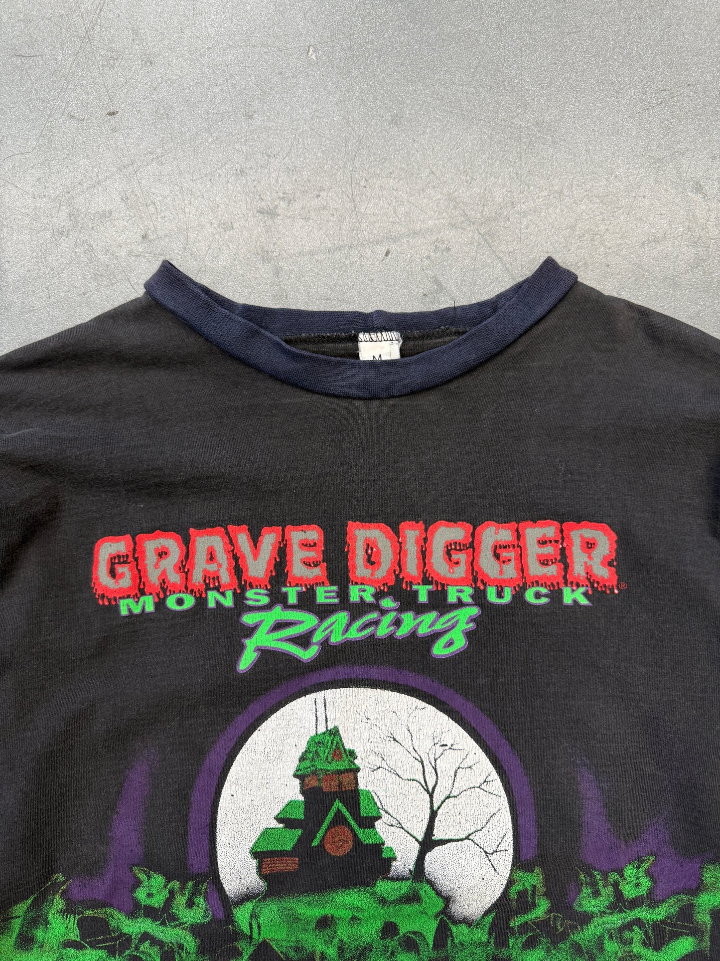 90S GRAVE DIGGER MONSTER TRUCK RACING AOP GRAVEYARD LS TEE (MADE IN USA TAG)