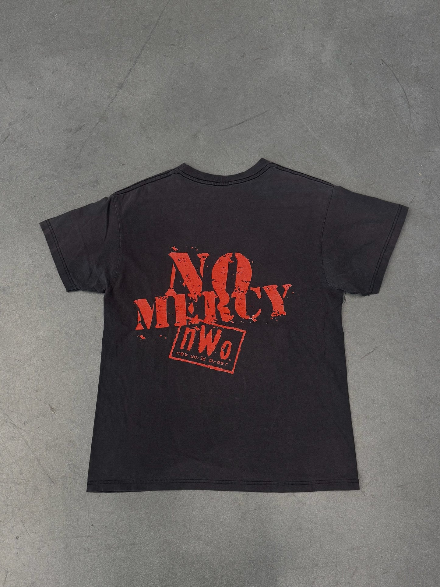 90S NWO NEW WORLD ORDER NO MERCY TEE (FADED PLANET TAG)