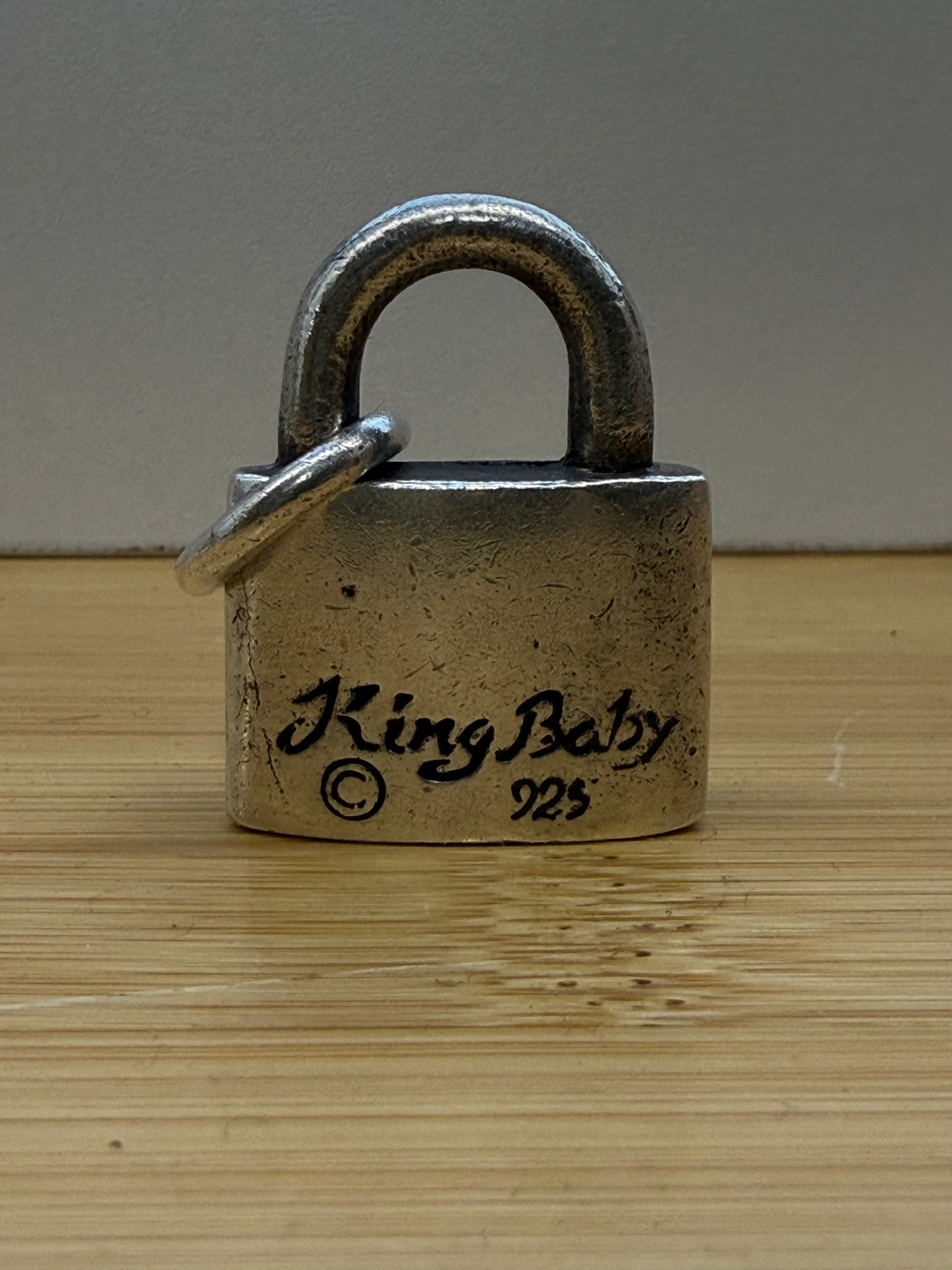 KING BABY FLEUR DE LIS SILVER LOCK PENDANT