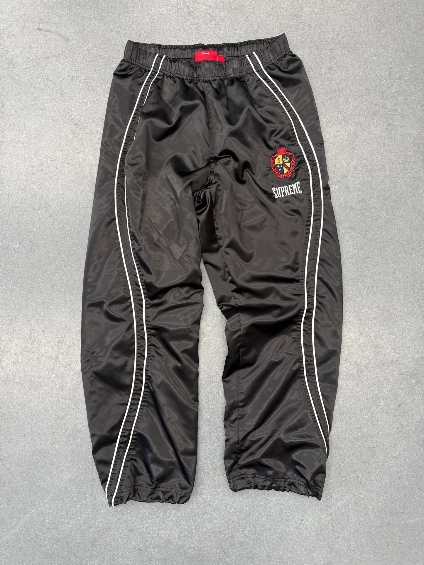 SS25 SUPREME CREST SATIN TRACK PANT - BLACK