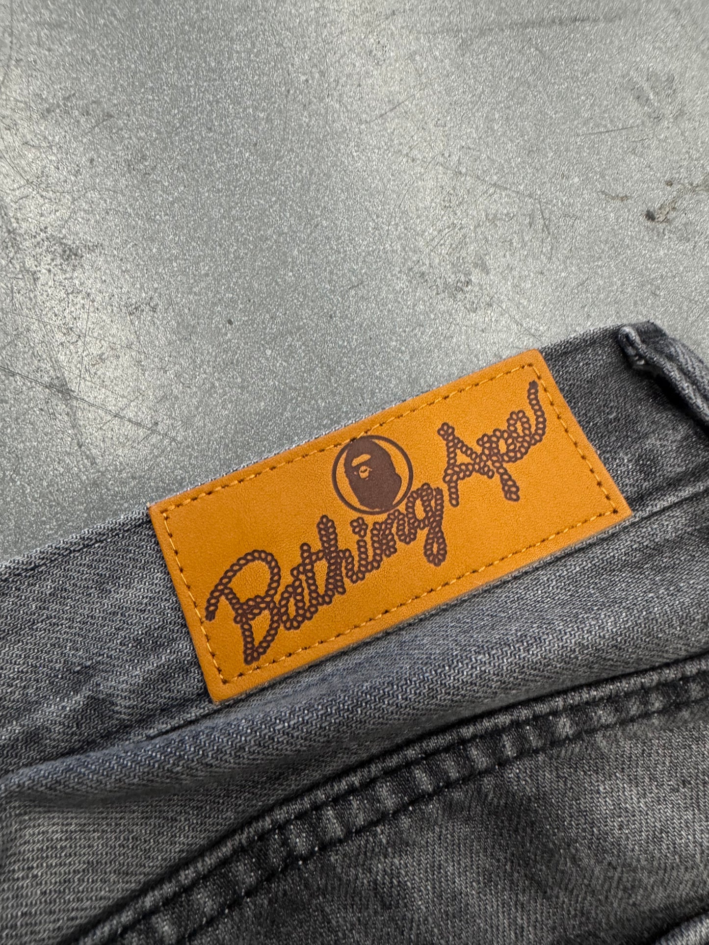 A BATHING APE BAPE HIGH TONE BLEACH REGULAR FIT DENIM PANTS MENS