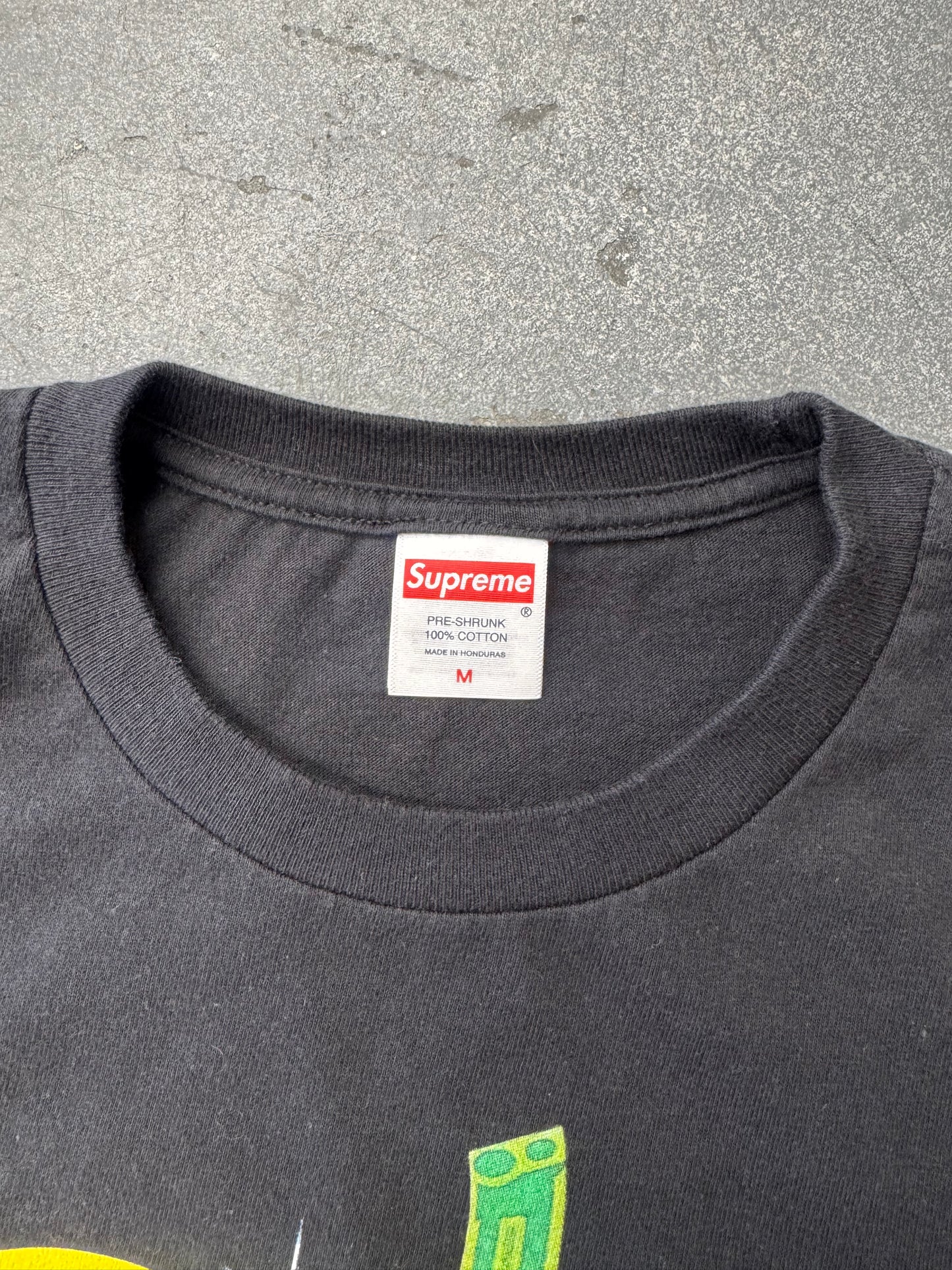 FW25 SUPREME ALL DOGS GO TO HEAVEN TEE - BLACK
