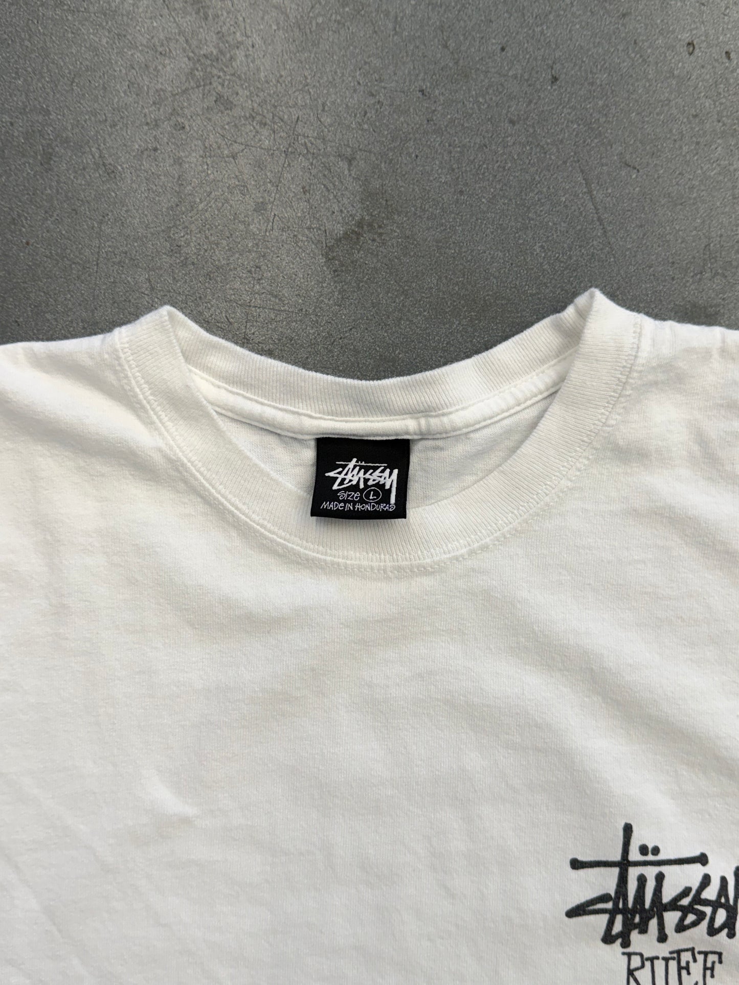 SS25 STUSSY WELL SUITED FOR THIS RUFF AND RUGGED WORLD TEE