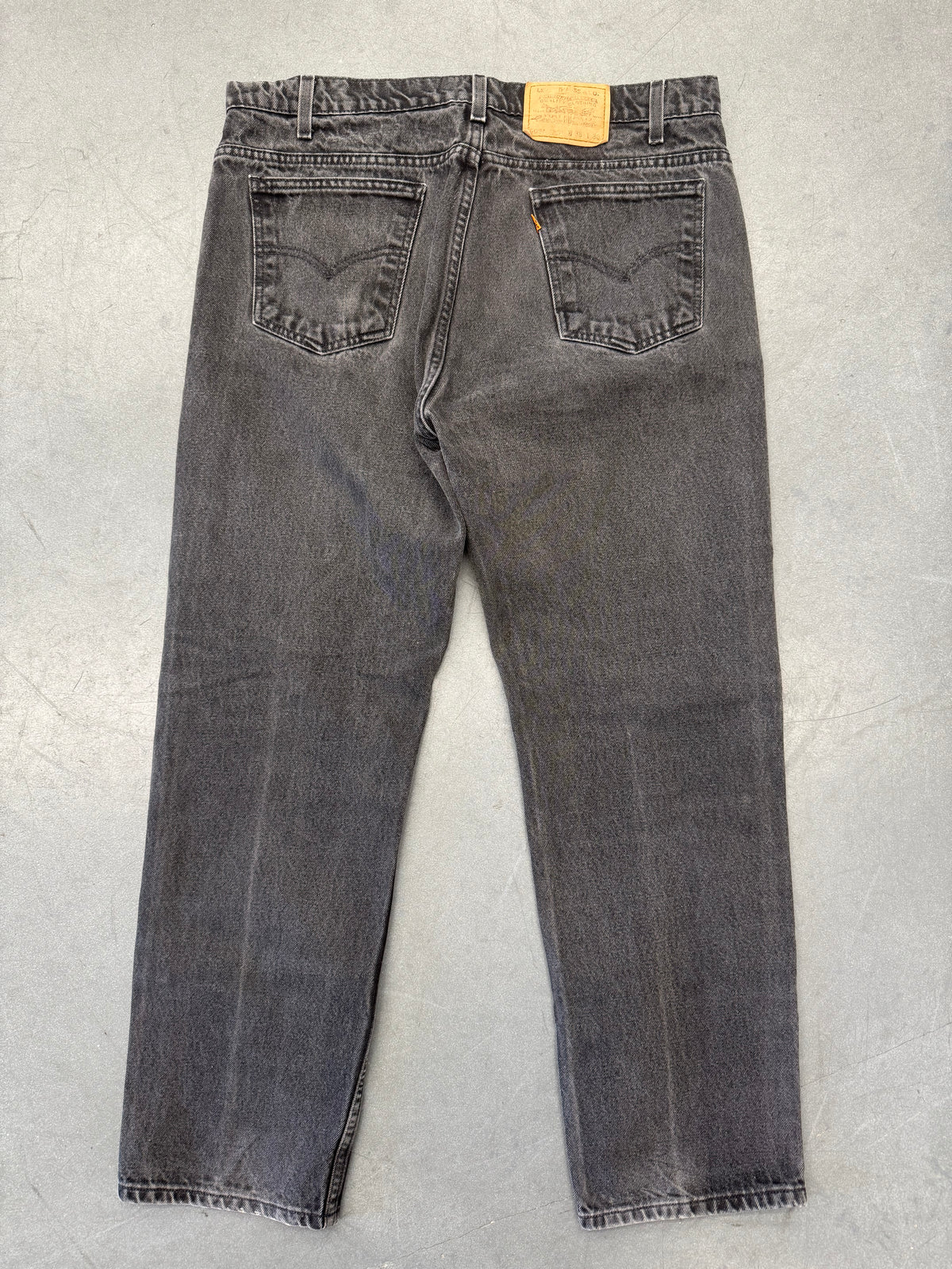 90S LEVI'S 550 ORANGE TAB RELAXED TAPERED JEANS - FADED BLACK