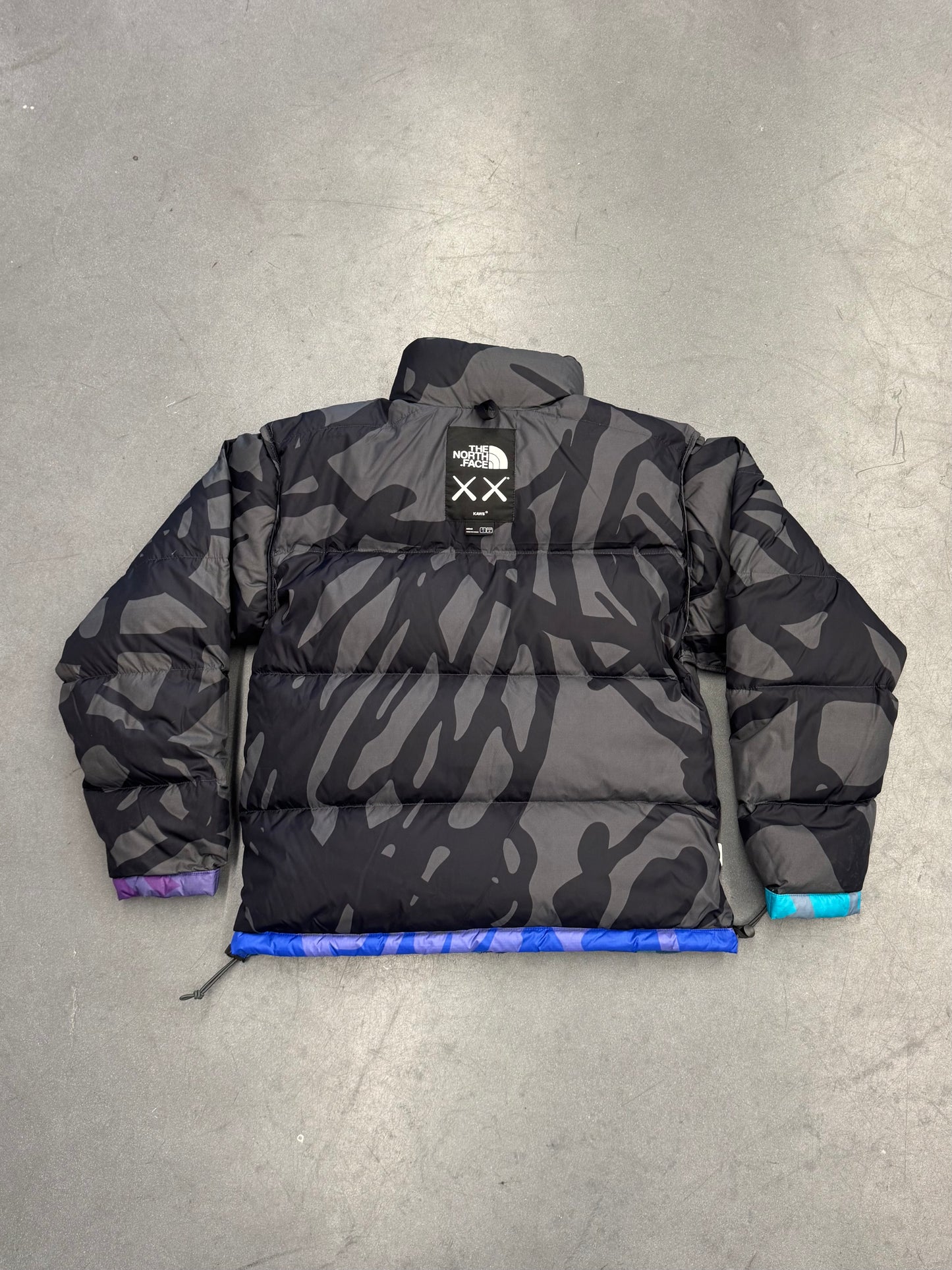 KAWS X THE NORTH FACE RETRO 1996 JACKET - MONTEREY BLUE NUPTSE PRINT