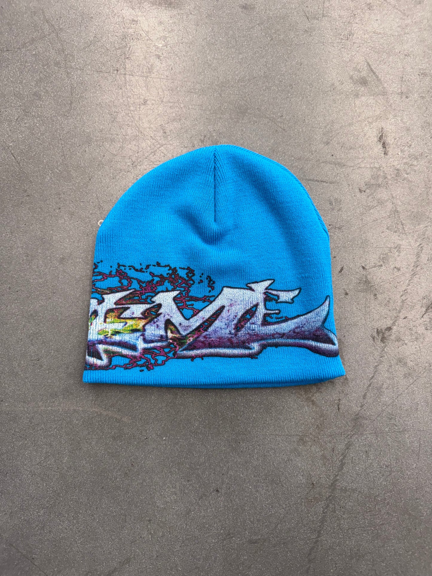 FW25 SUPREME TAG BEANIE (NEW IN REPLACEMENT BAG)