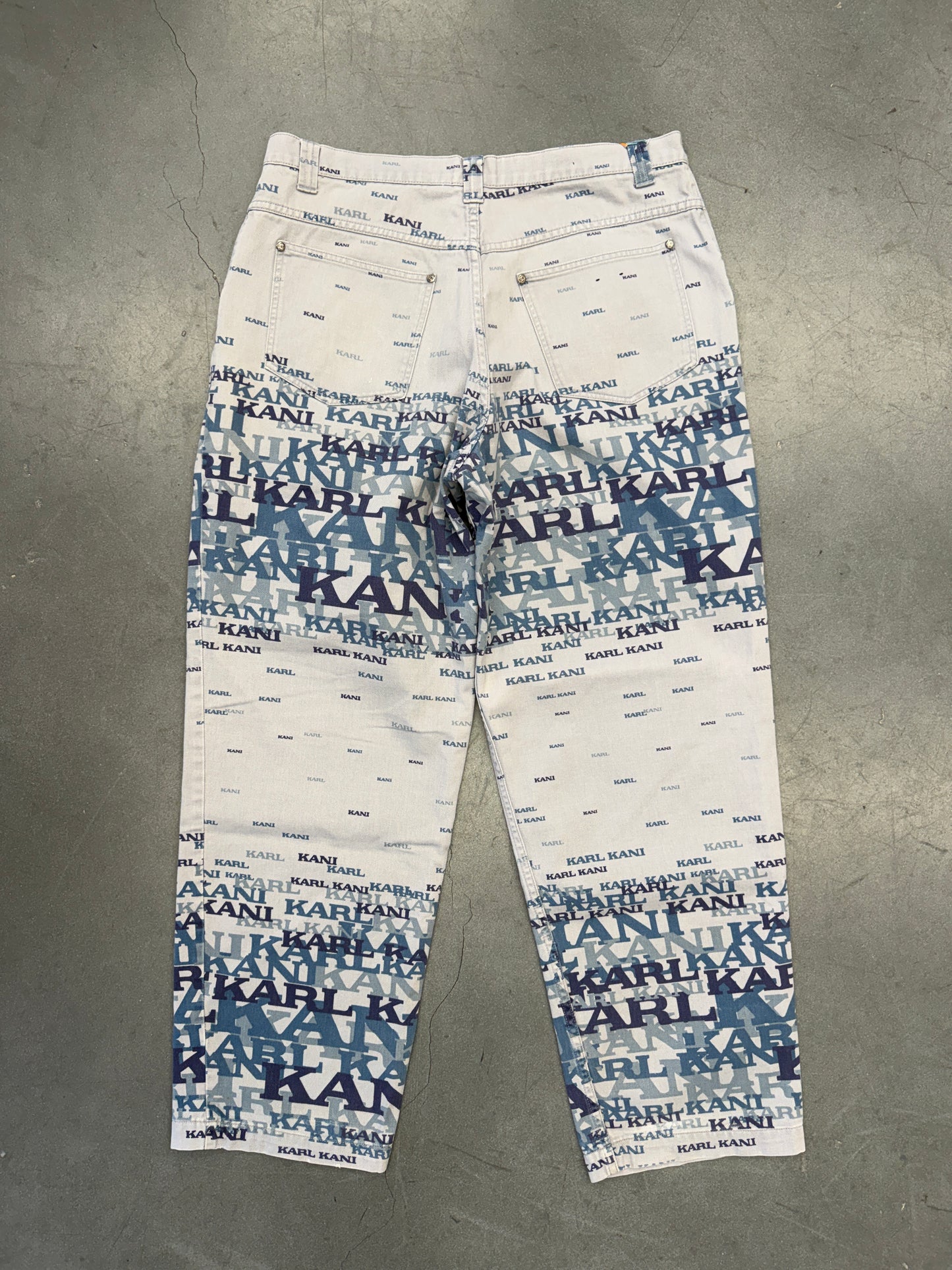 90'S KARL KANI AOP TEXT JEANS