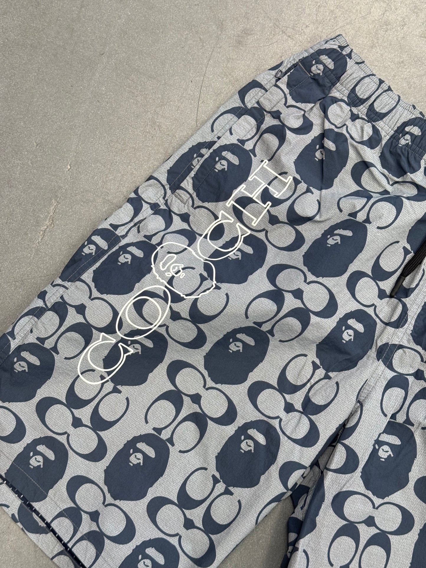 2021 BAPE X COACH SHORTS - NAVY