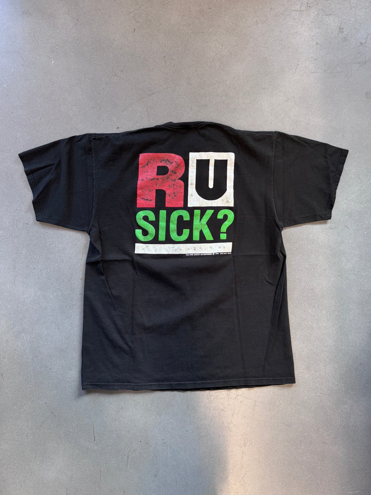 1991 RACISM IS AN ILLNESS TEE (JERZEES TAG)