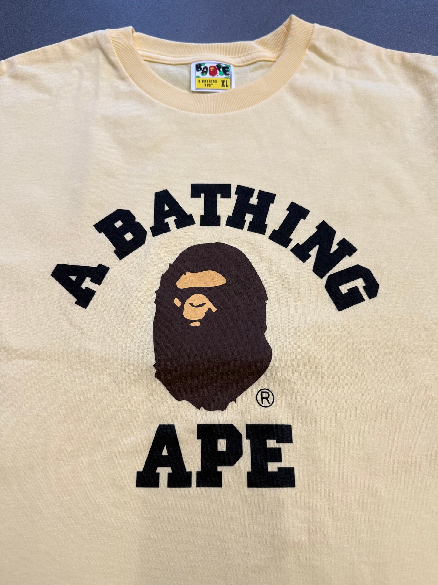 A BATHING APE COLLEGE TEE - YELLOW (XL) (NEW IN BAG)