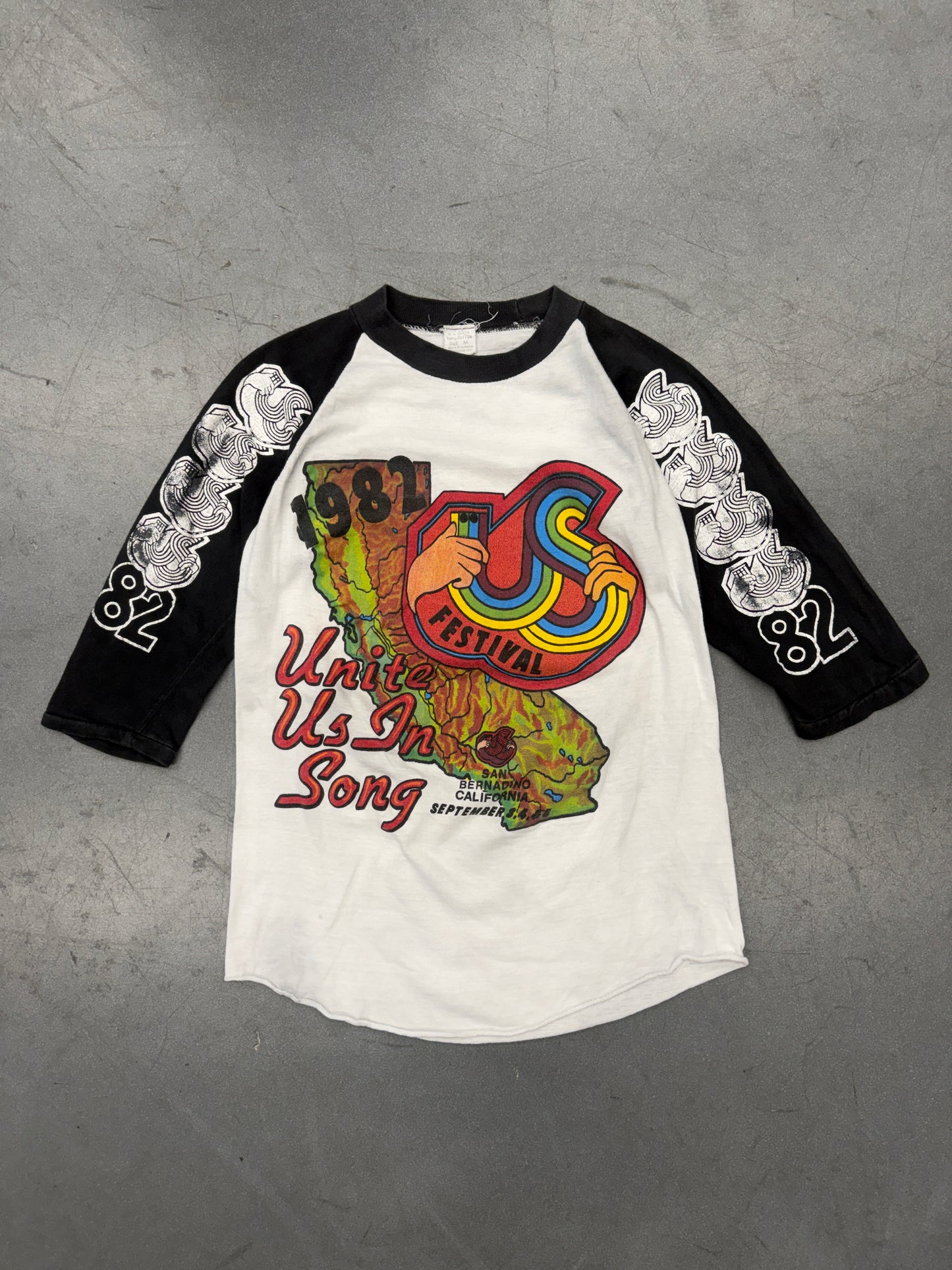 1982 THE US FESTVIAL 'UNITE US IN SONG' RAGLAN TEE (100% COTTON TAG)