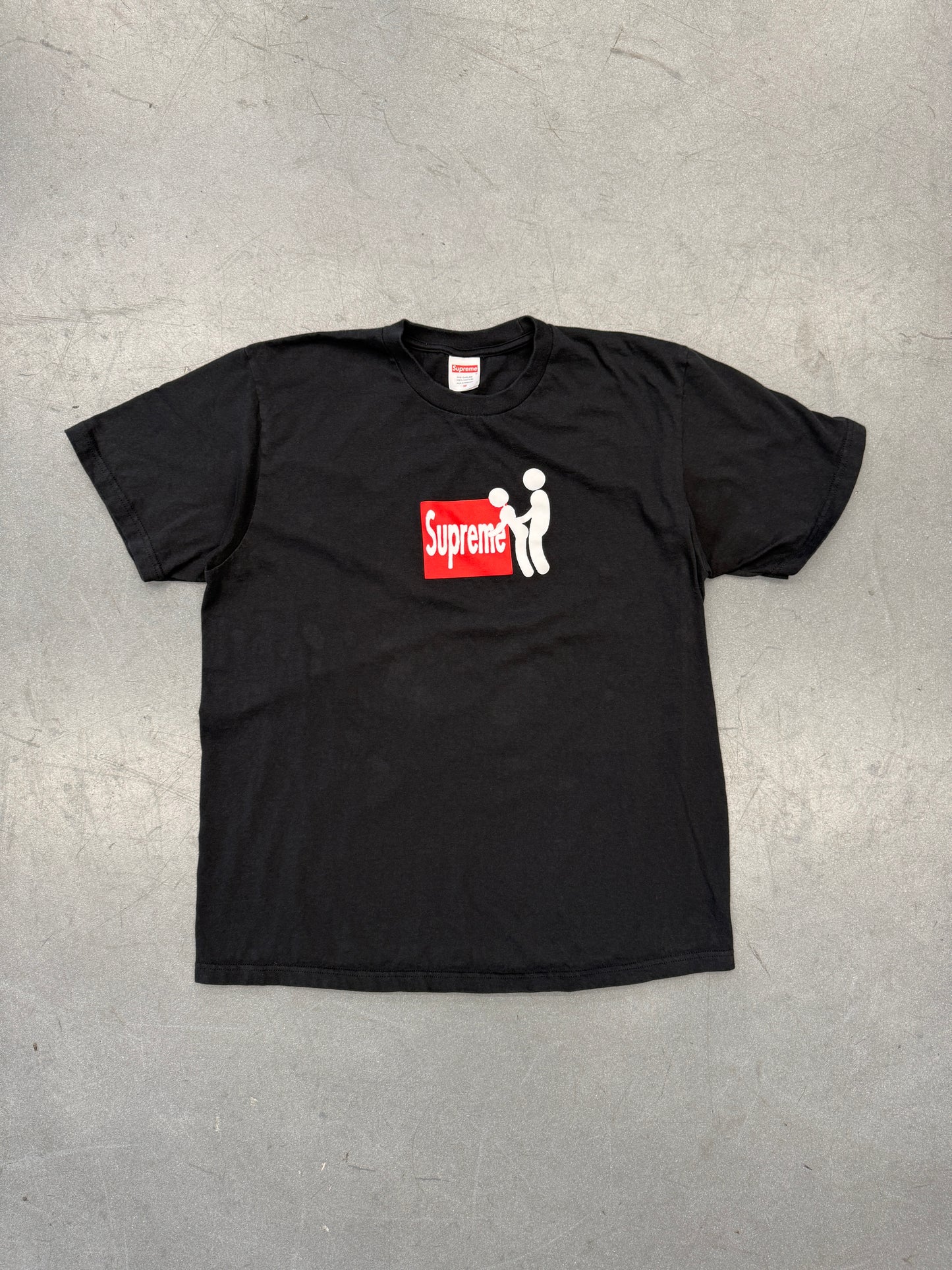 FW25 SUPREME STICK TEE - BLACK