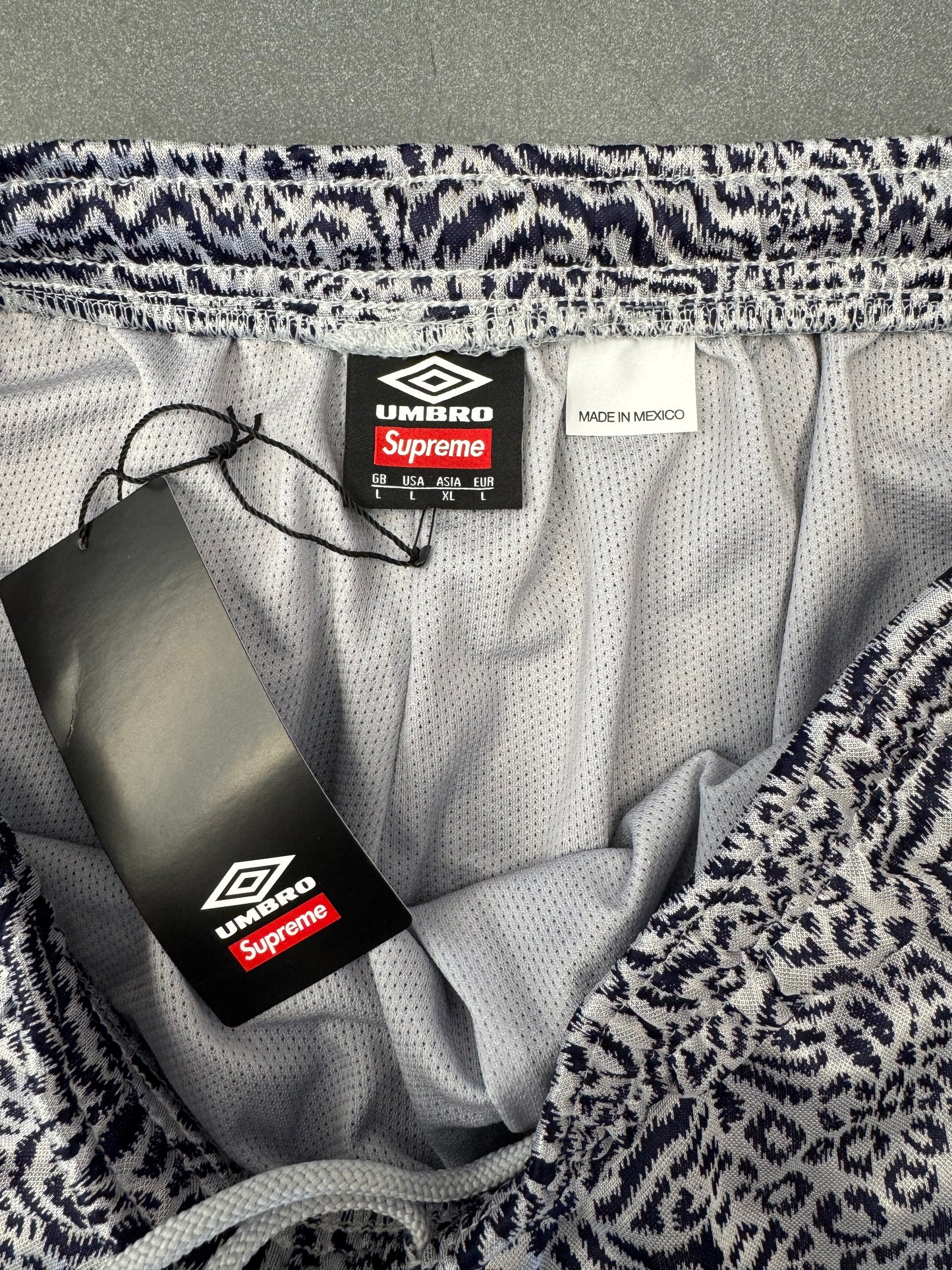 SS23 SUPREME UMBRO JACQUARD ANIMAL PRINT SOCCER SHORT - NAVY