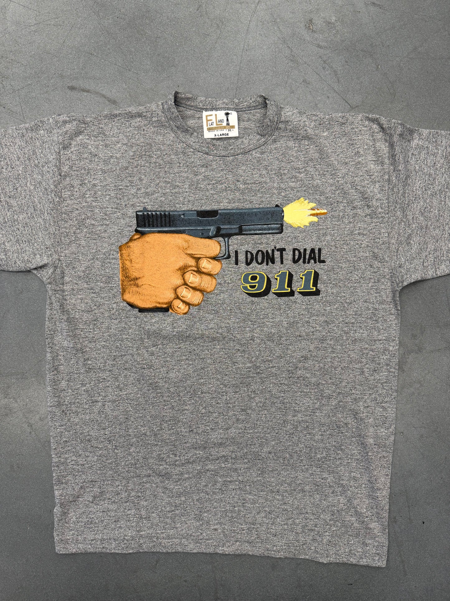 90'S I DON’T DIAL 911 DIRTY DEALER TEE (FLAT LAND TAG)