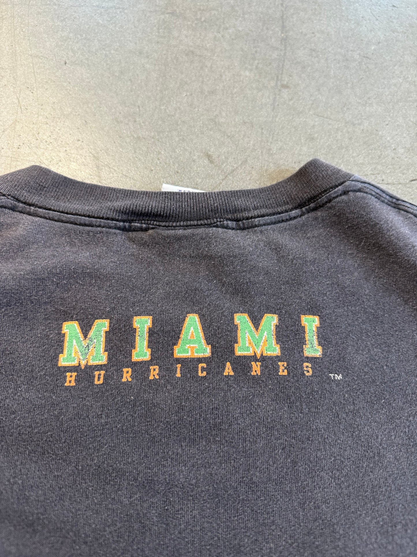 1994 MIAMI HURRICANES SEBASTIAN BASKETBALL BREAKTHROUGH SHATTERED TEE (ACTIVE IMAGE TAG)