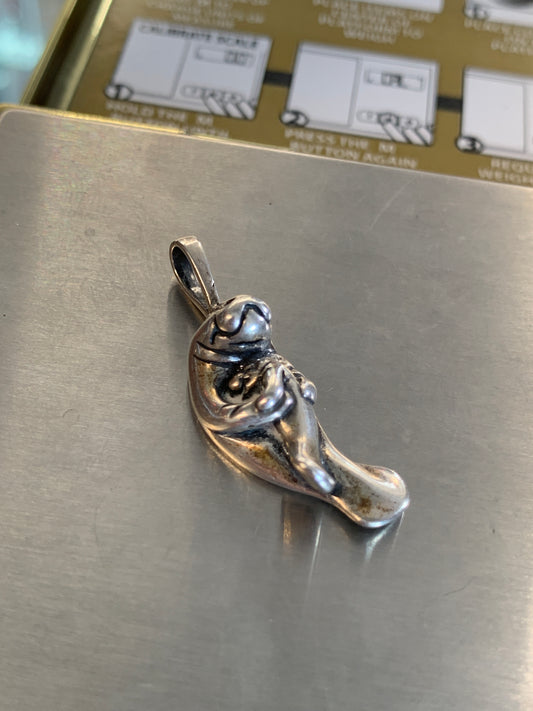 HUGGING MANATEE SILVER PENDANT (3.9 GRAMS)
