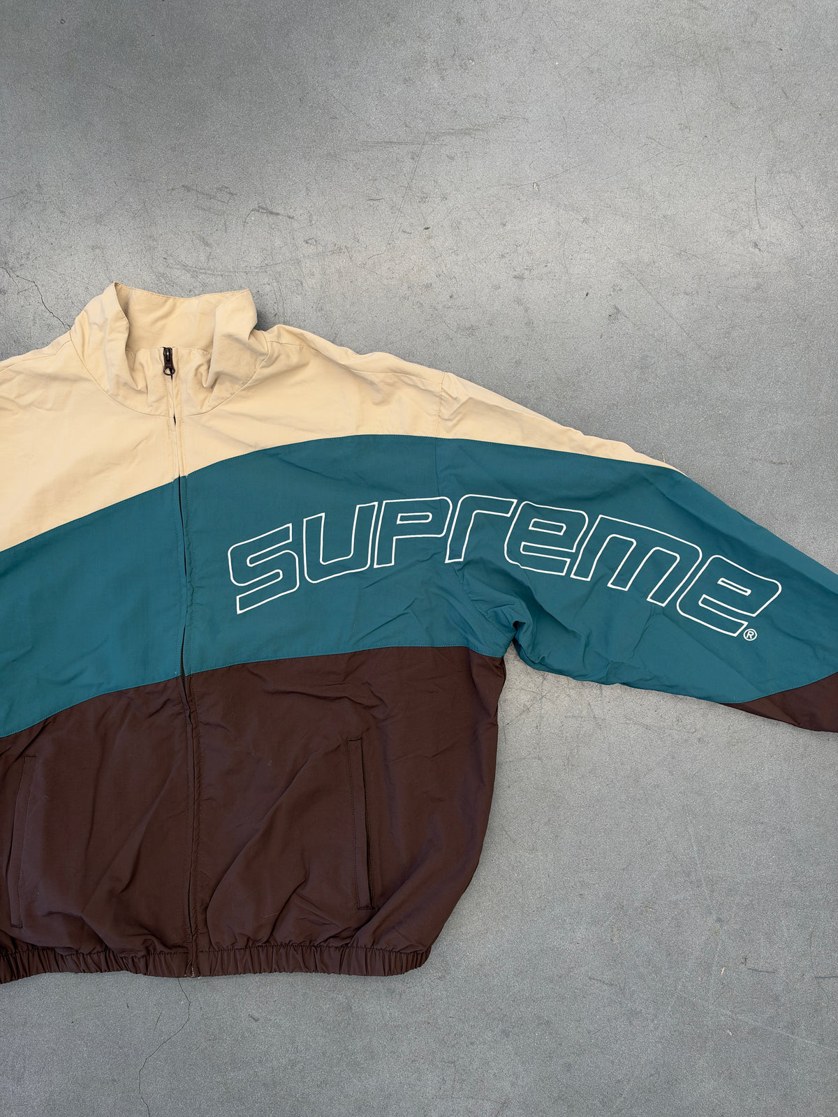 SS24 SUPREME CURVE TRACK JACKET - BROWN