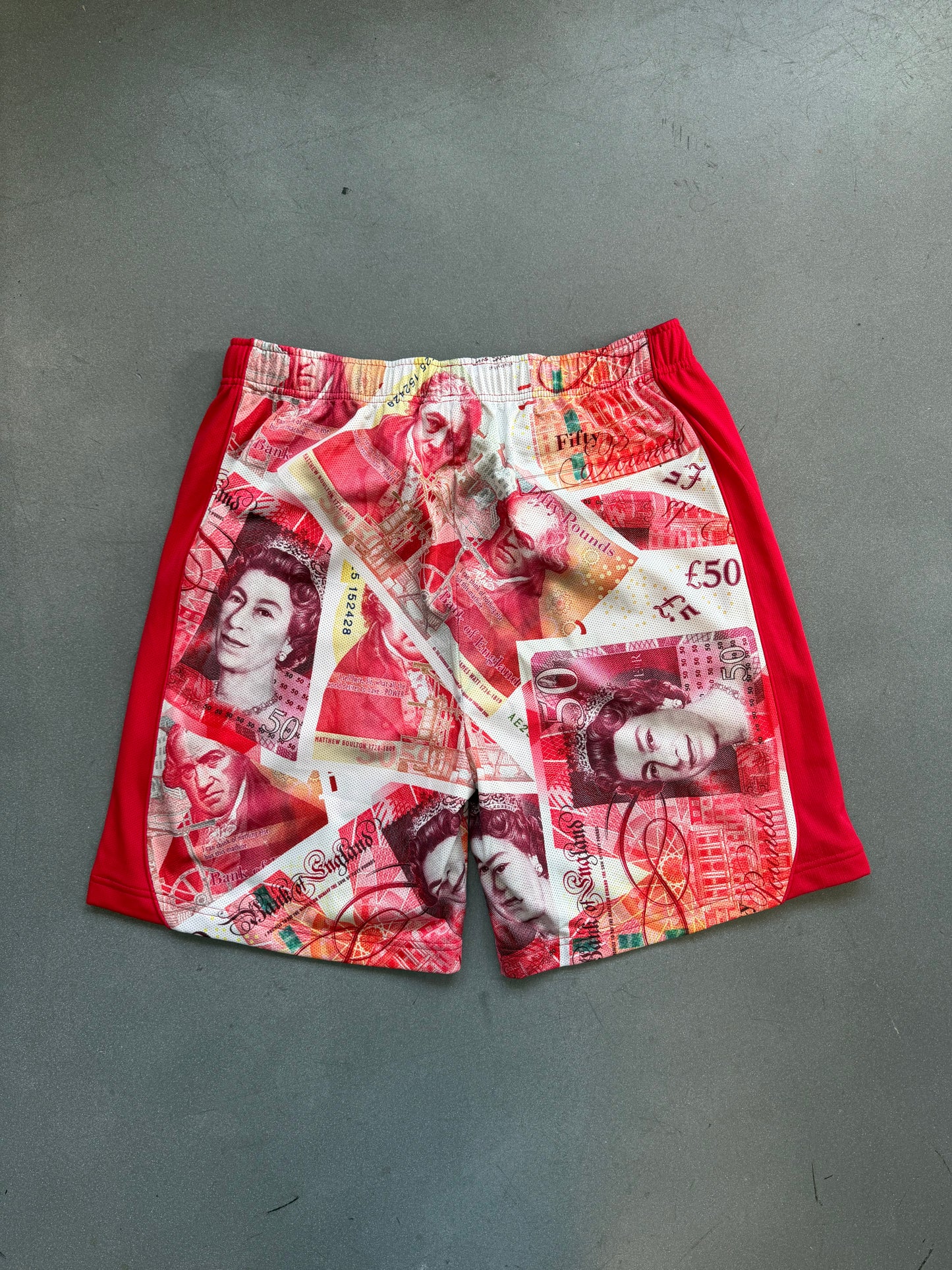 FW25 SUPREME POUNDS SOCCER SHORT - RED