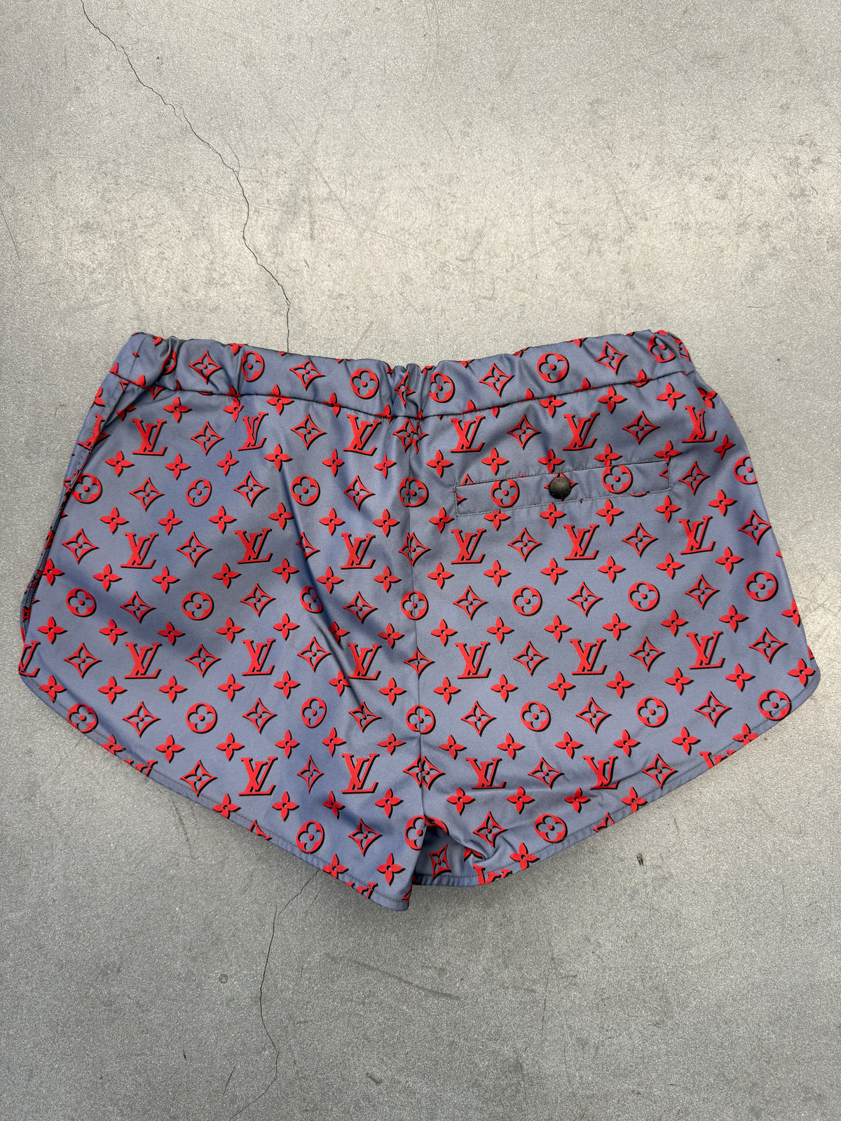 FW23 LOUIS VUITTON RED MONOGRAM TECHNICAL RUNNING SHORTS