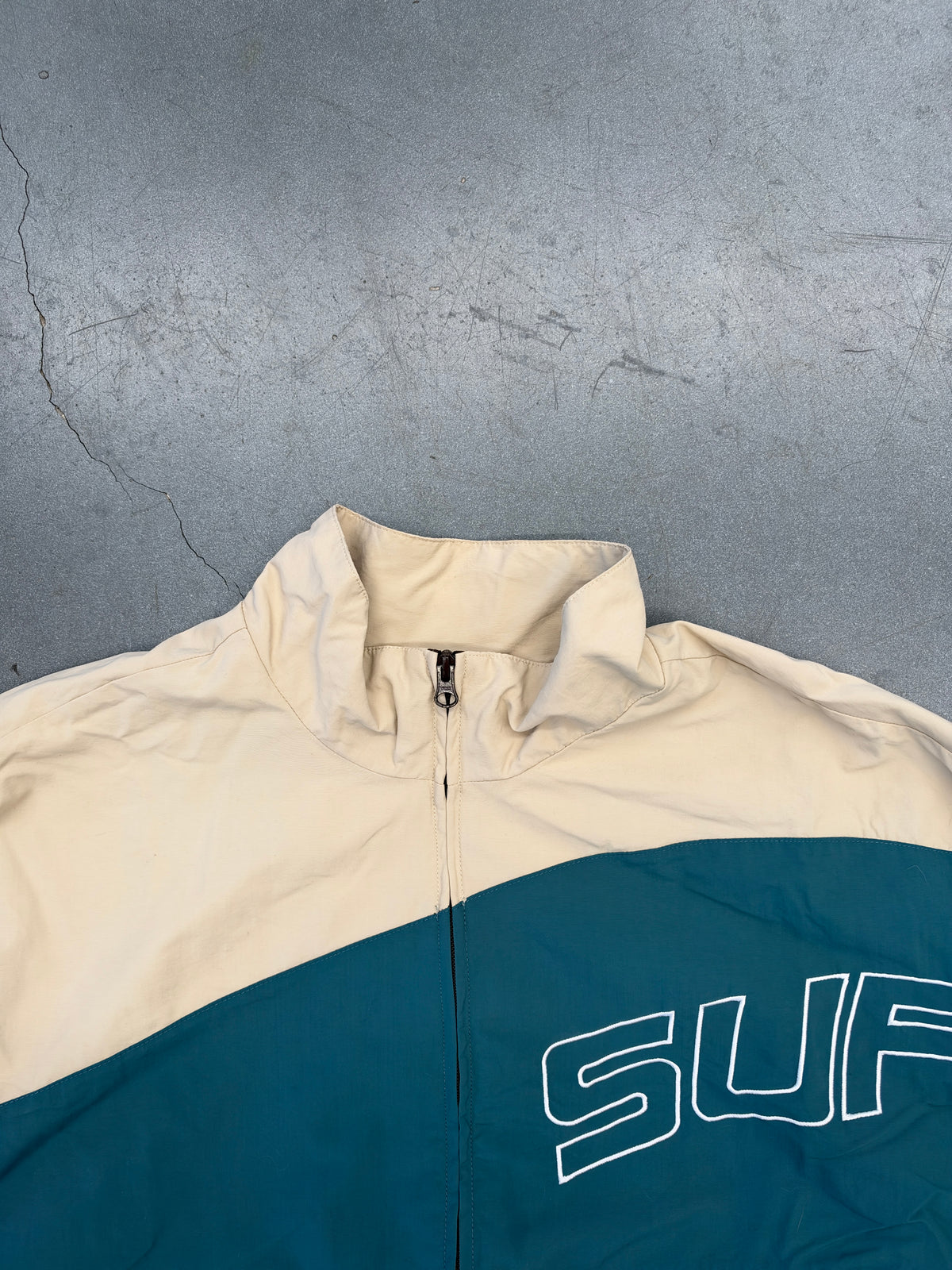 SS24 SUPREME CURVE TRACK JACKET - BROWN