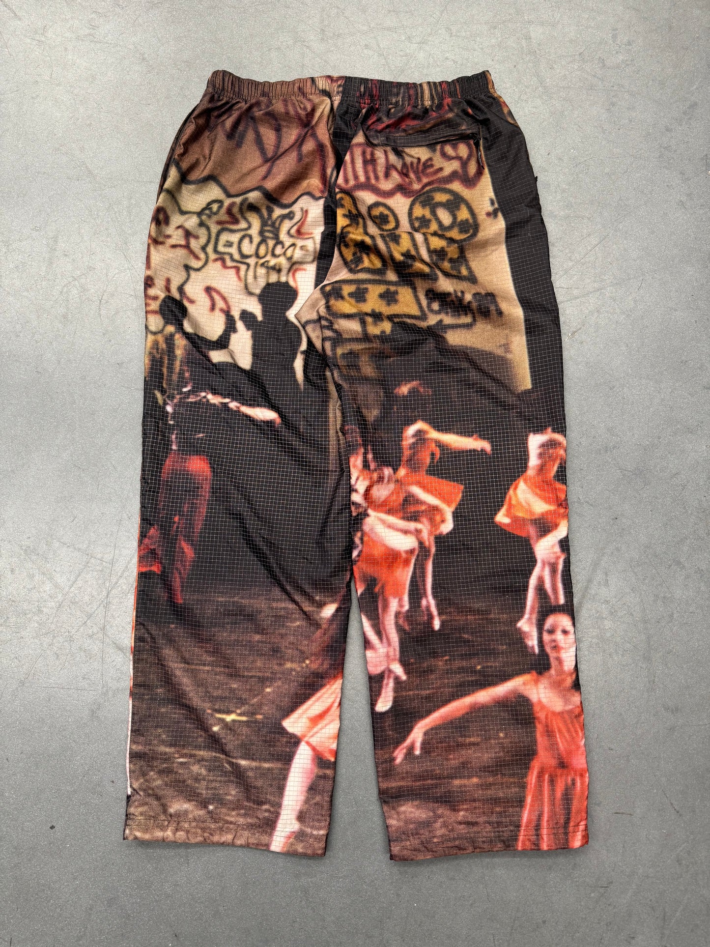 SS25 SUPREME REFLECTIVE RIPSTOP TRACK PANTS