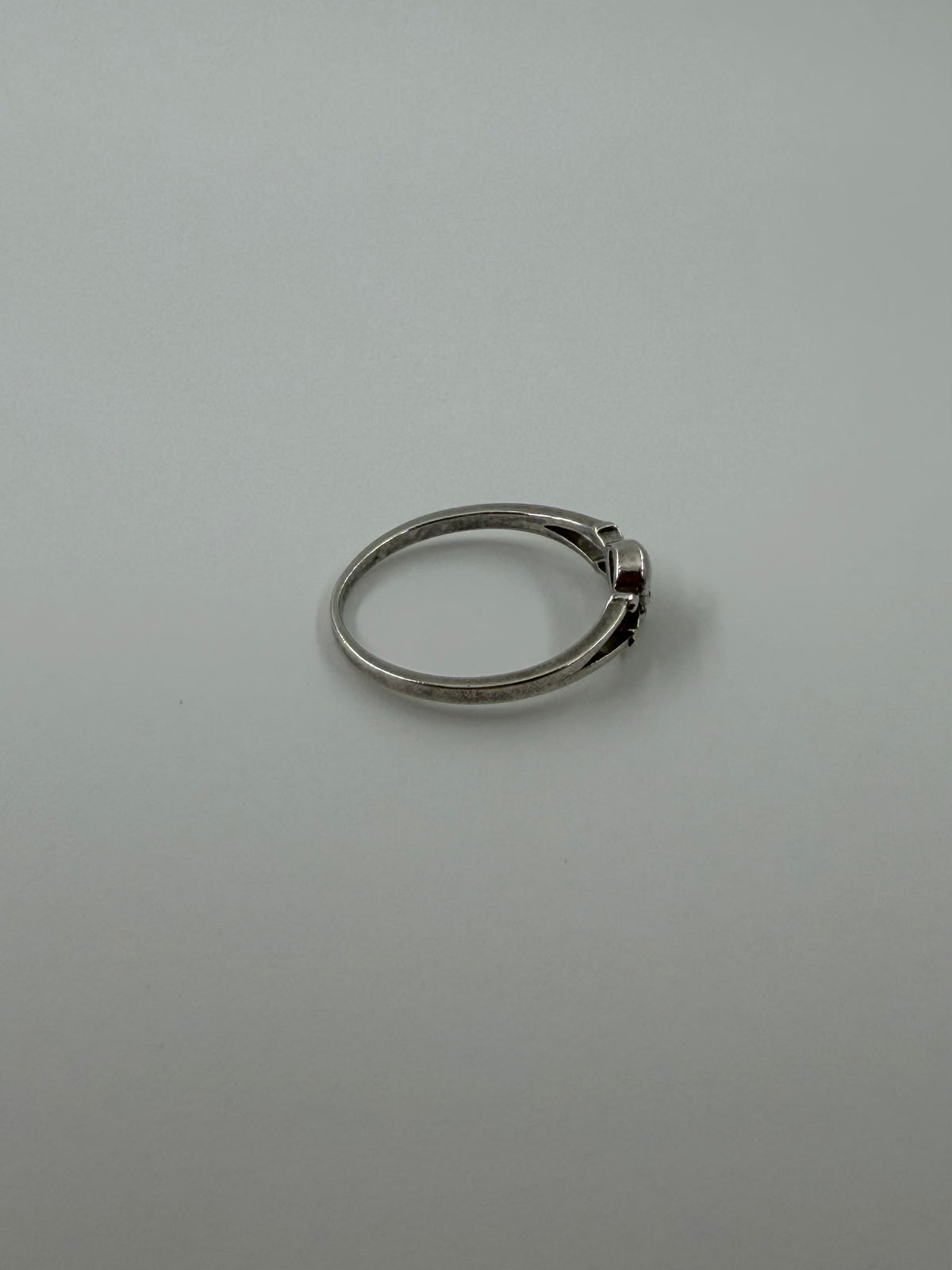 TINY SKULL AND CROSSBONES STERLING SILVER RING