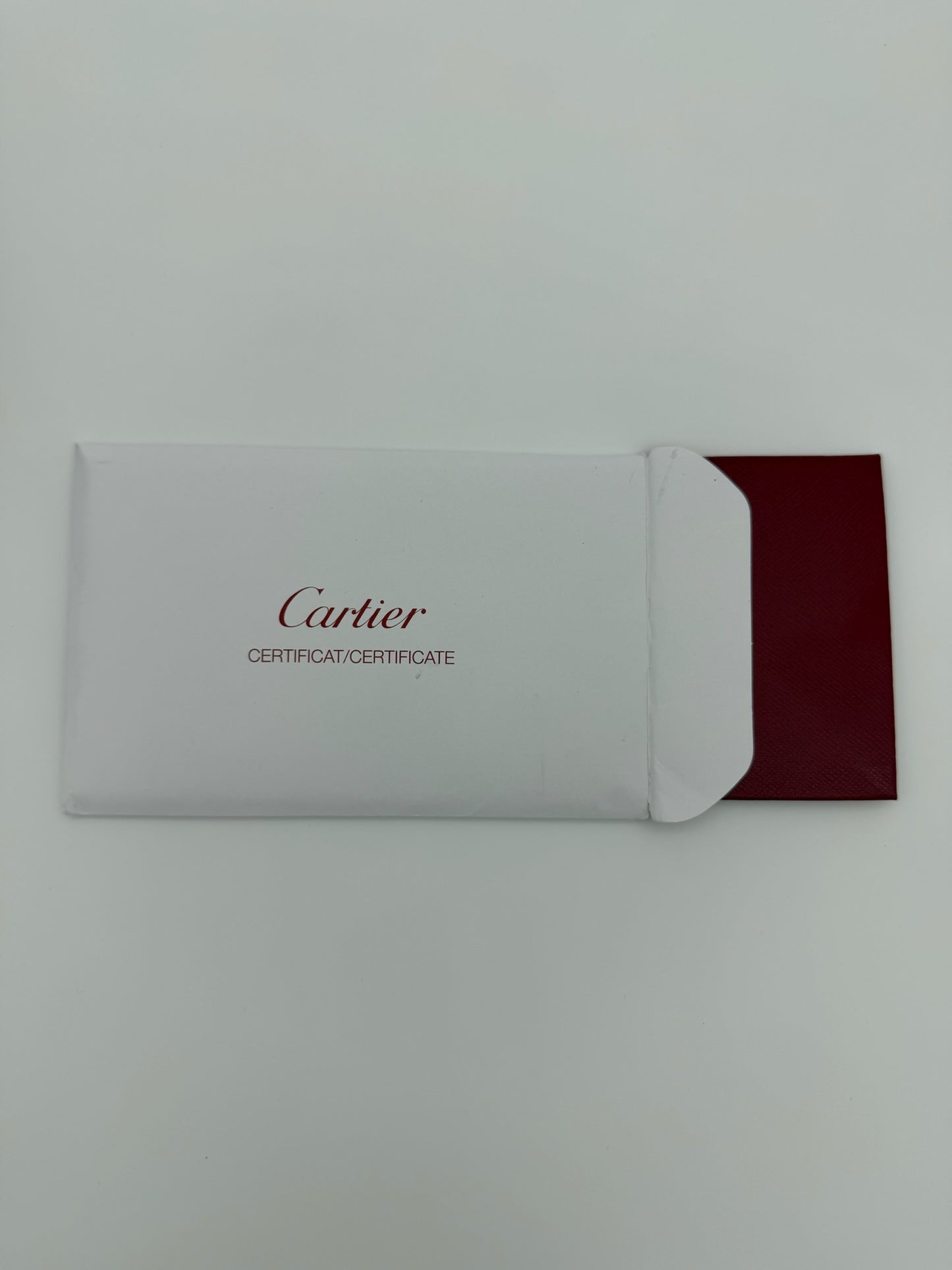 CARTIER 18K TRINITY BRACELET (WITH CASE AND COA) (ON NAVY STRING COMES WITH GREY REPLACEMENT)