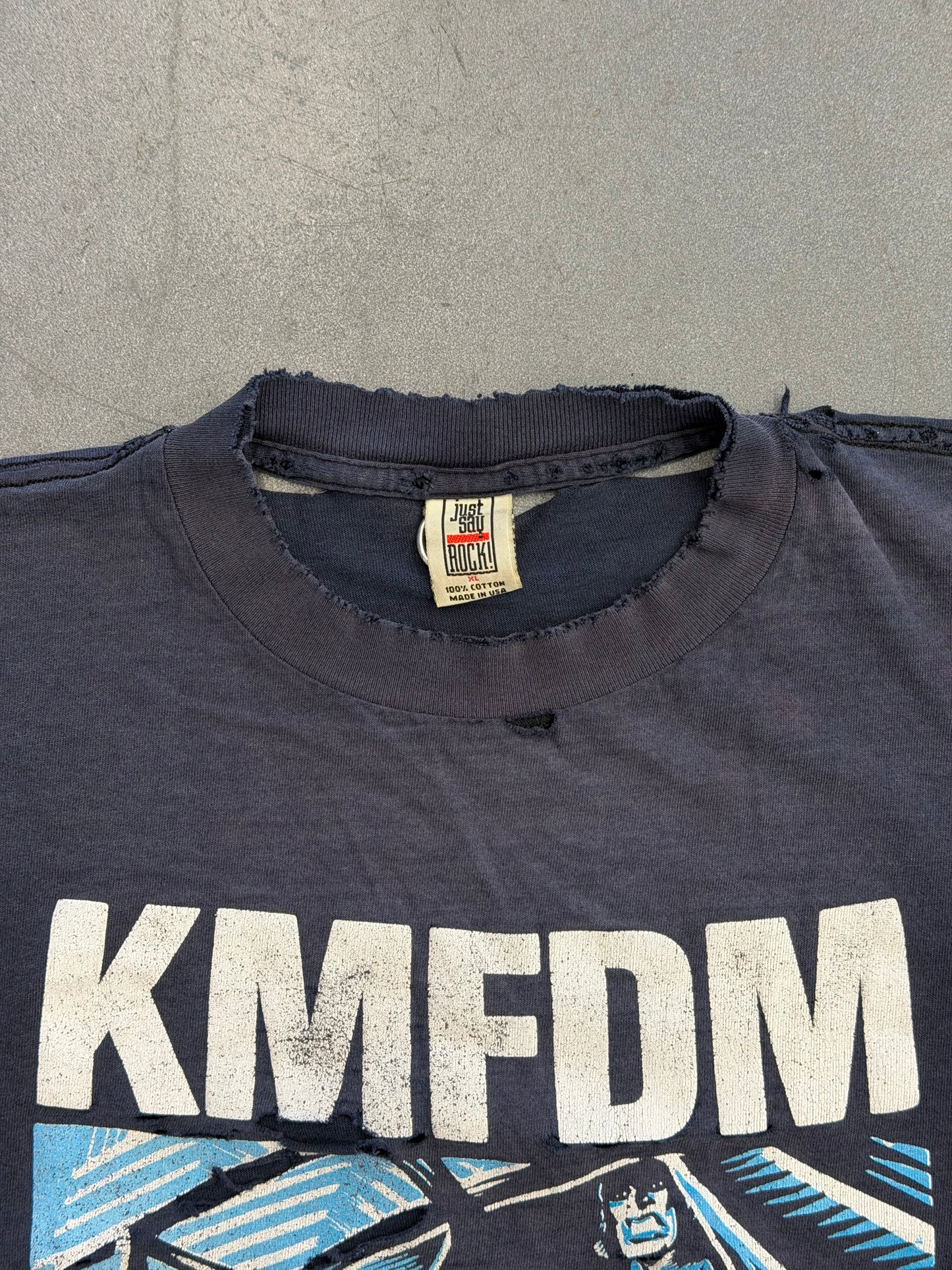 KMFDM A DRUG AGAINST WAR TEE (JUST SAY ROCK TAG)