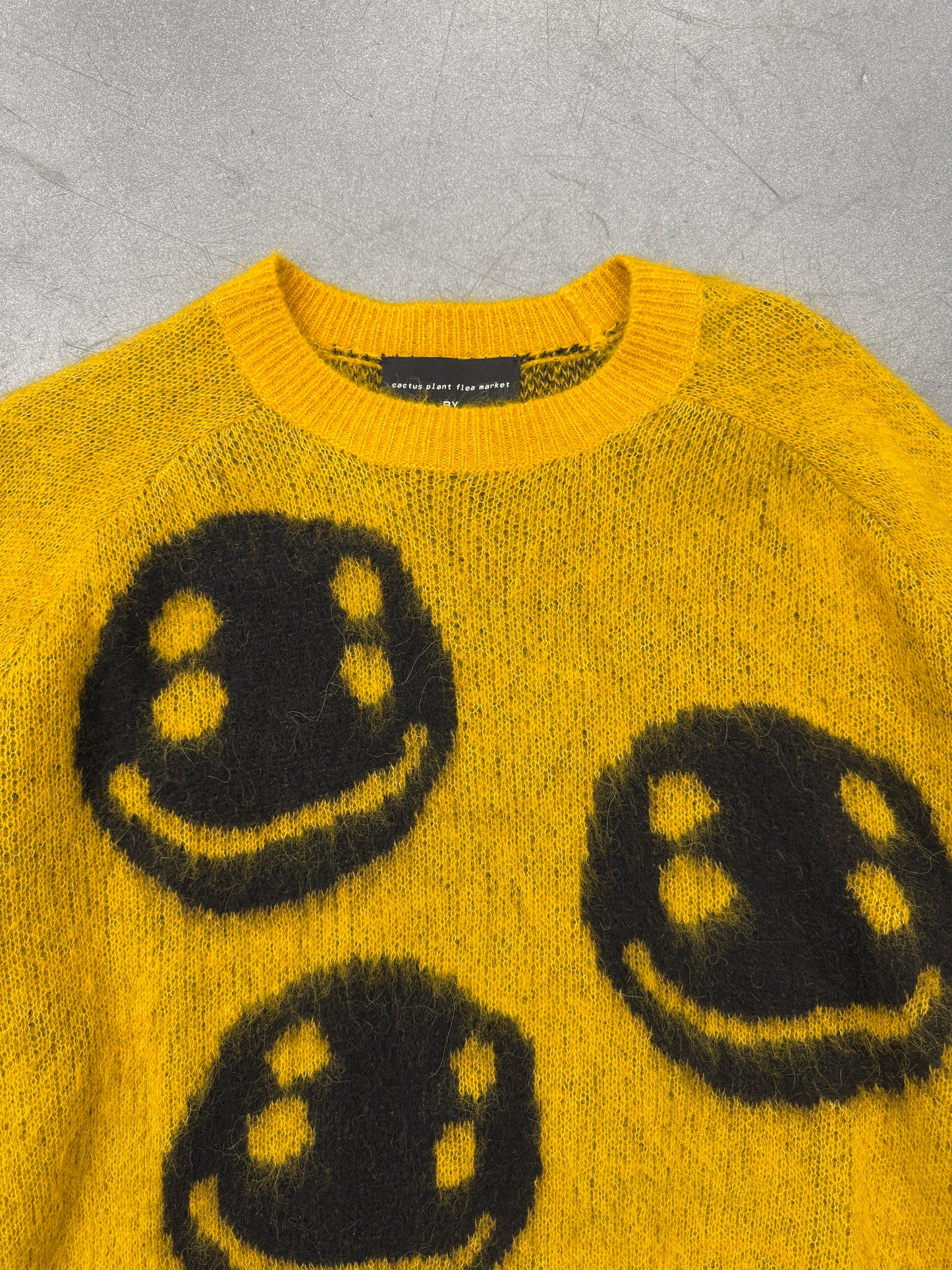 CACTUS PLANT FLEA MARKET MARC JACOBS SMILEY FACE SWEATER