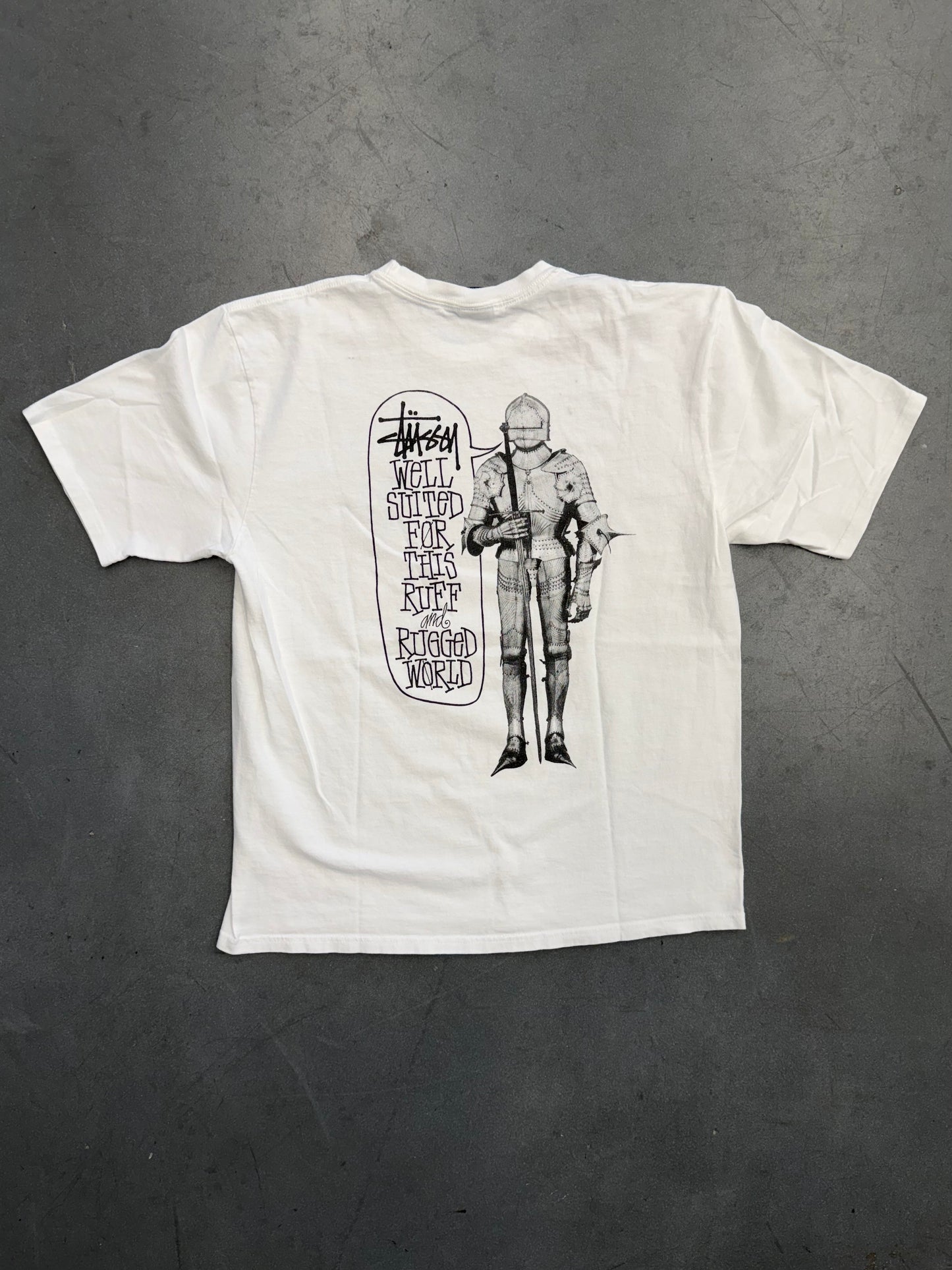 SS25 STUSSY WELL SUITED FOR THIS RUFF AND RUGGED WORLD TEE