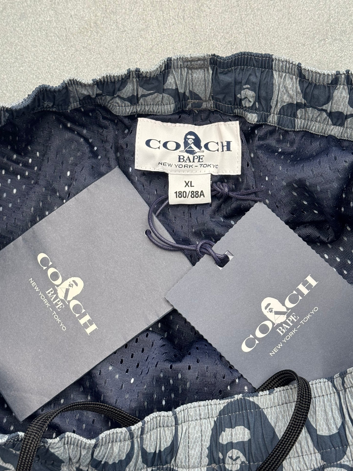 2021 BAPE X COACH SHORTS - NAVY