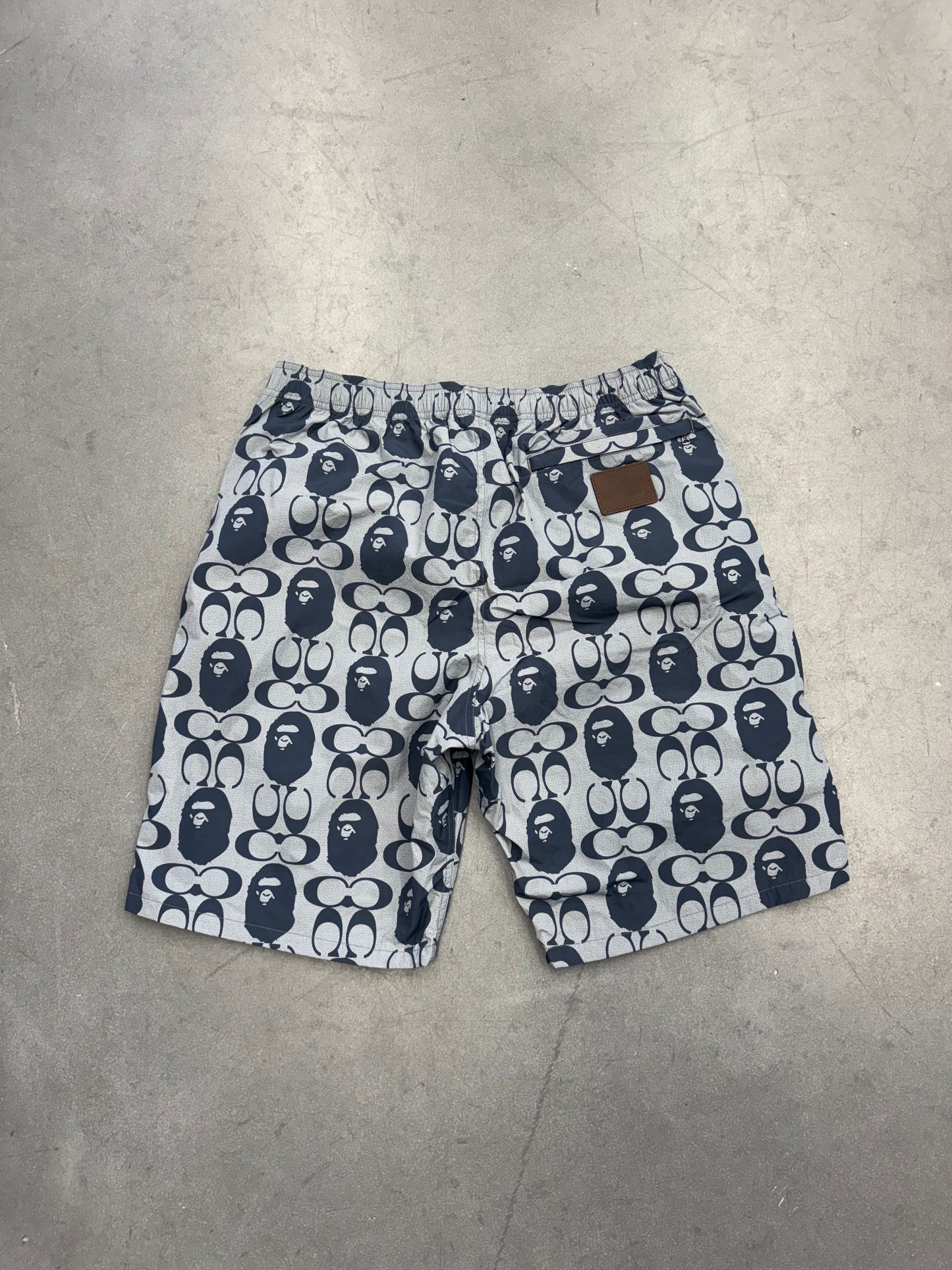 2021 BAPE X COACH SHORTS - NAVY
