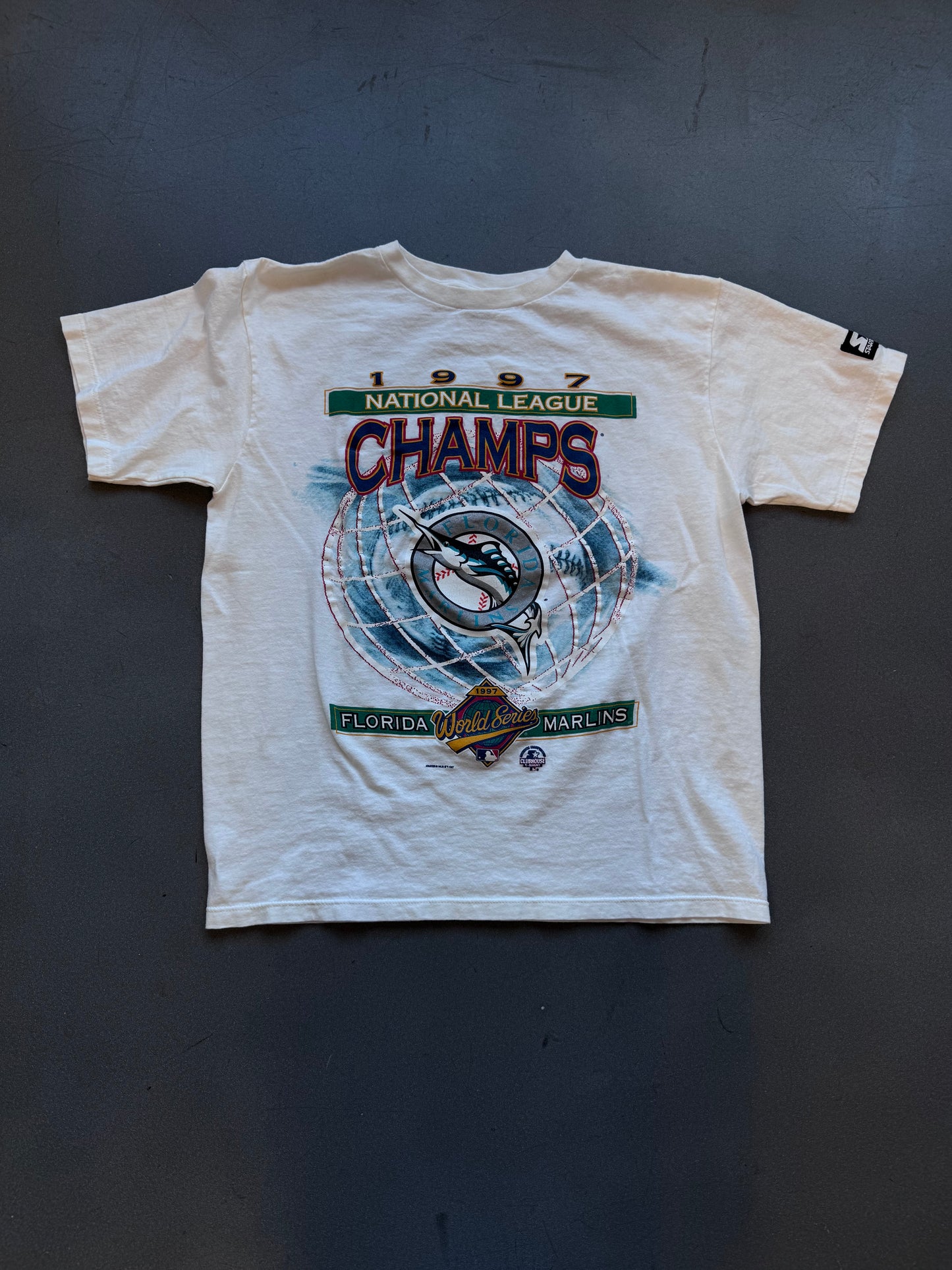 1997 FLORIDA MARLINS NATIONAL LEAGUE CHAMPS GLOBE CLUBHOUSE TEE (STARTER TAG)