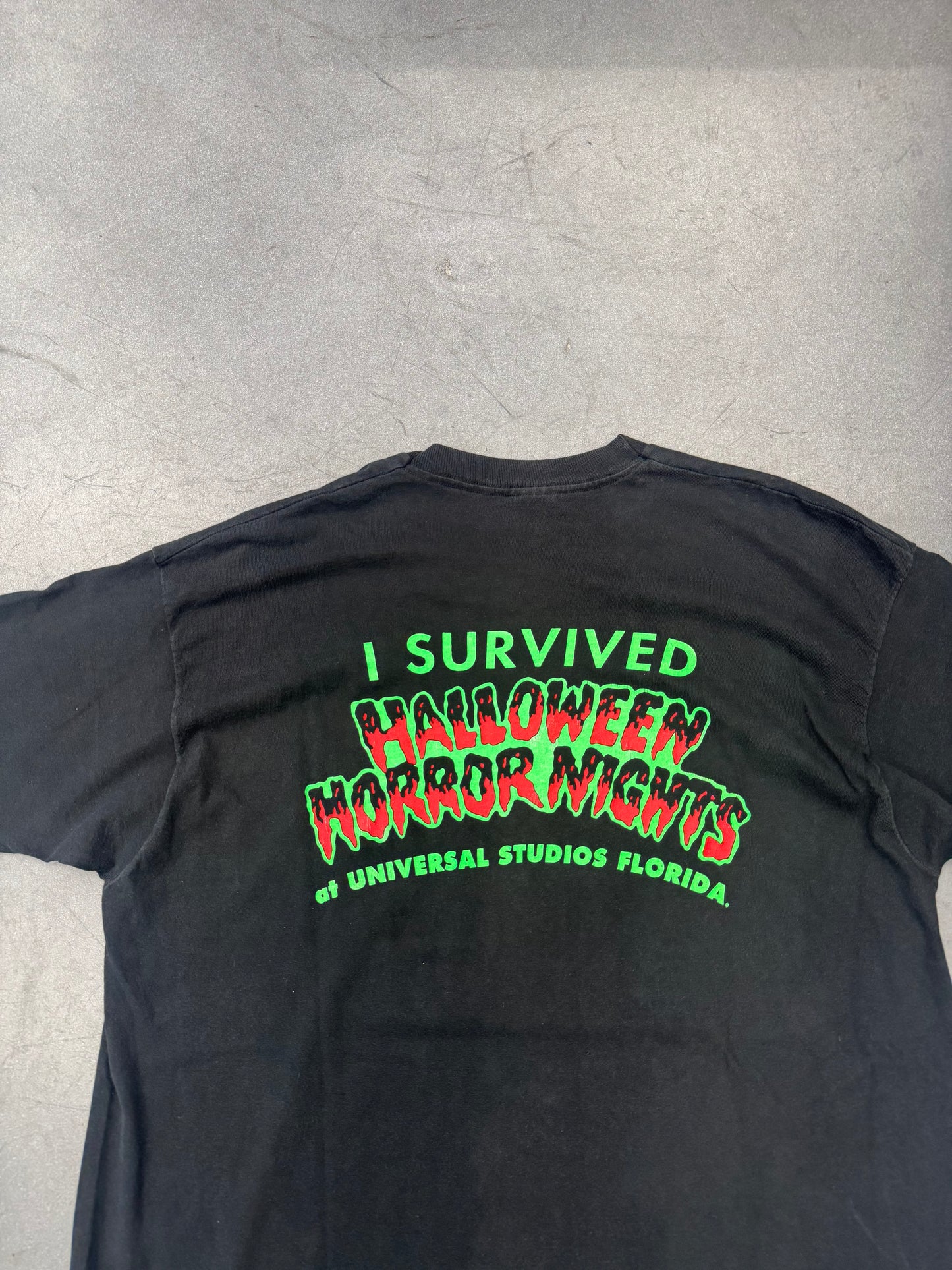 90S UNIVERSAL HALLOWEEN HORROR NIGHTS "I SURVIVED" CHAINSAW TEE (FOTL TAG)