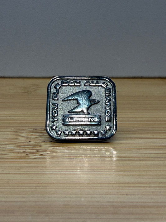 FW19 SUPREME PLEDGE ALLEGIANCE PIN - SILVER