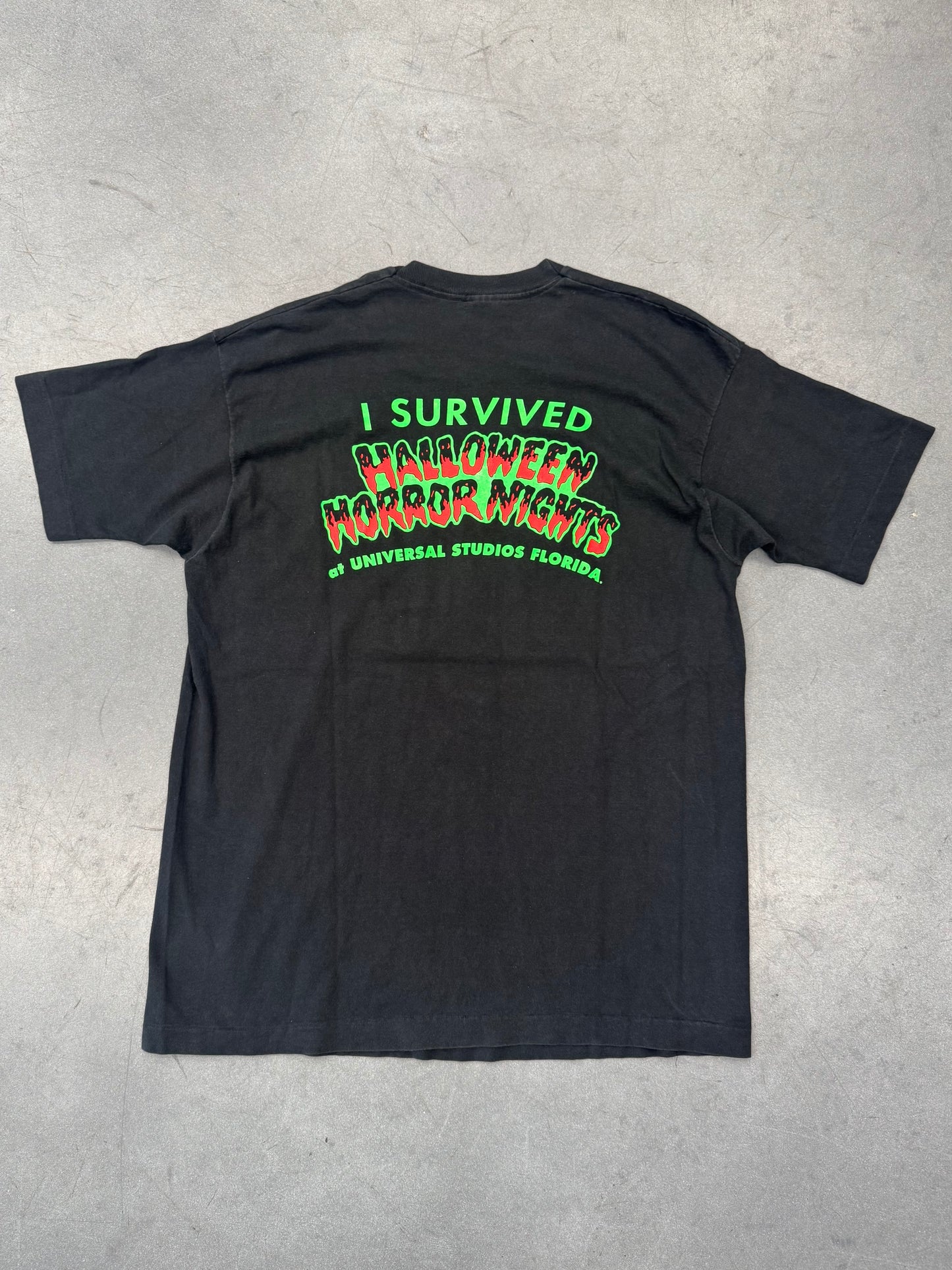 90S UNIVERSAL HALLOWEEN HORROR NIGHTS "I SURVIVED" CHAINSAW TEE (FOTL TAG)