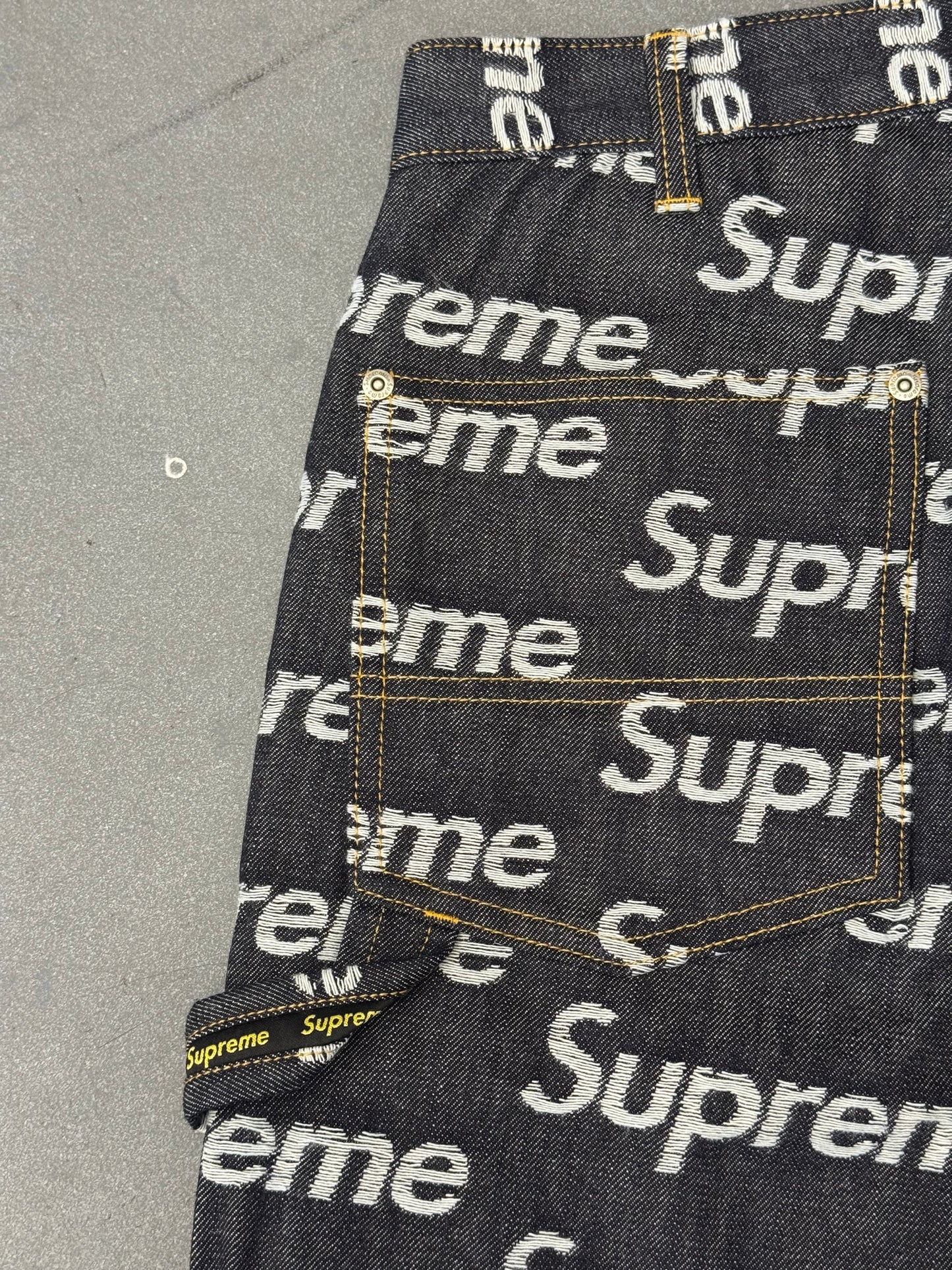 FW25 SUPREME JACQUARD LOGOS DOUBLE KNEE DENIM PAINTER JEAN - RIGID INDIGO