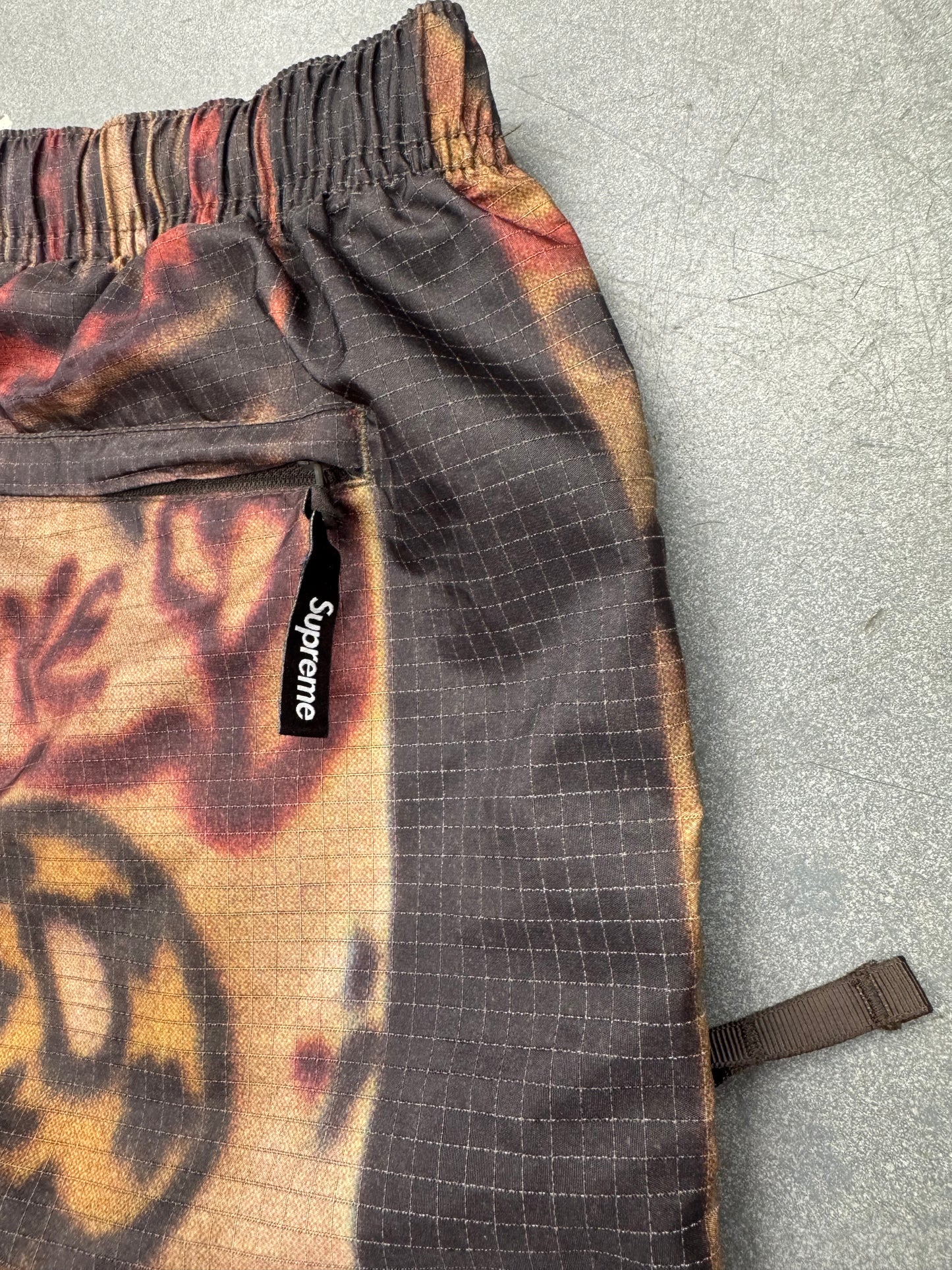 SS25 SUPREME REFLECTIVE RIPSTOP TRACK PANTS