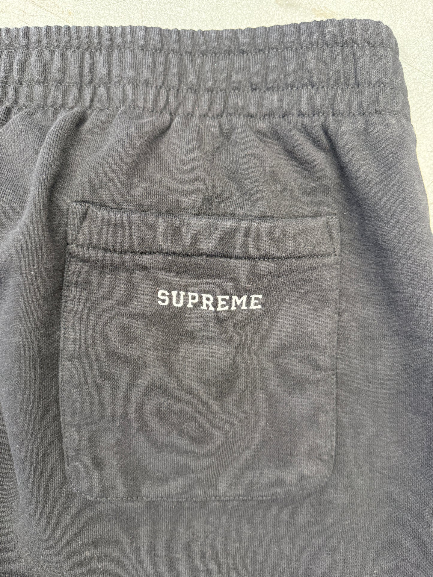 SS26 SUPREME MONSTER JAM GRAVE DIGGER GREEN/PURPLE SWEATPANTS