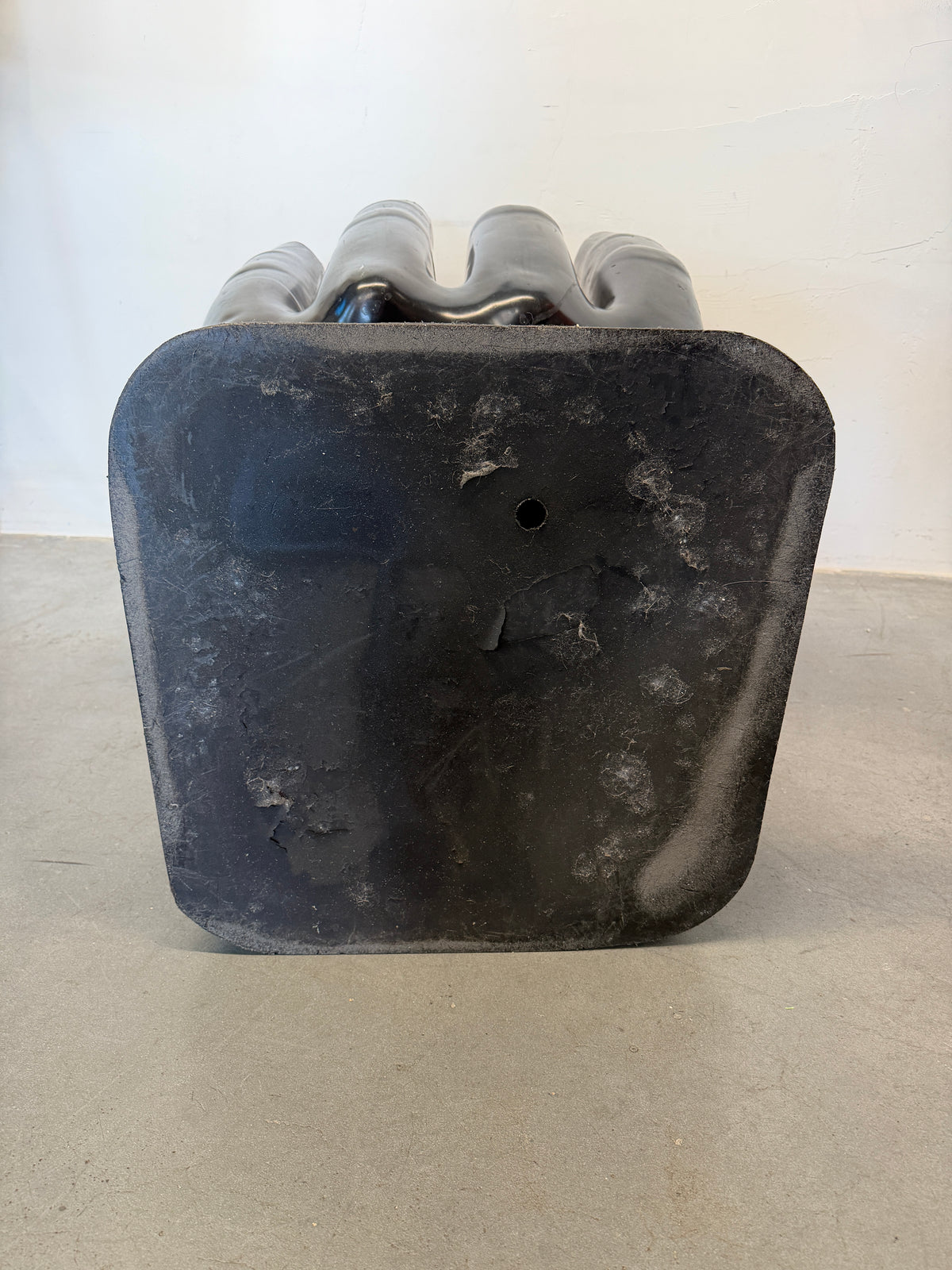 VINTAGE BLACK MOLDED PLASTIC HAND CHAIR