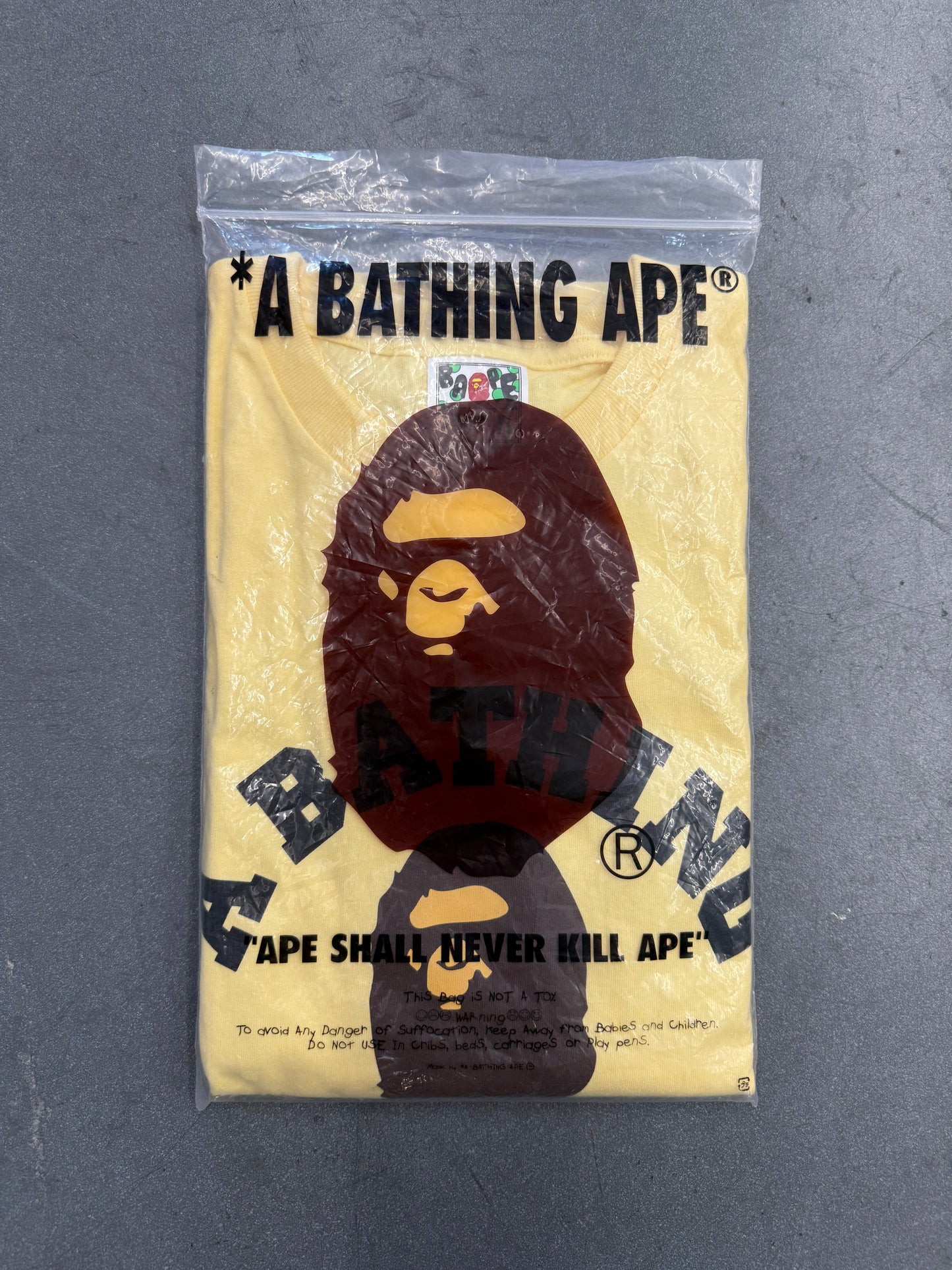 A BATHING APE COLLEGE TEE - YELLOW (XL) (NEW IN BAG)