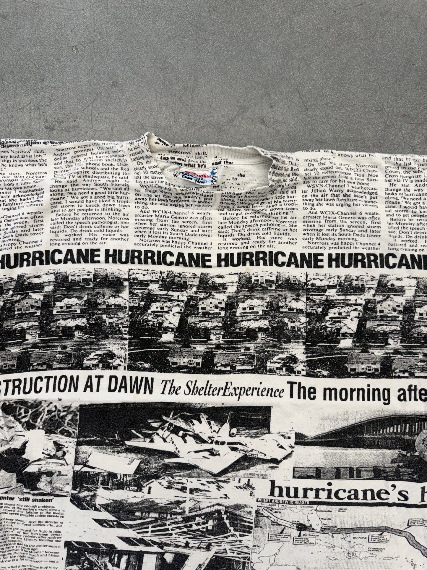 1992 HURRICANE ANDREW NEWSPAPER AOP TEE (TROPICAL GOLD TAG)