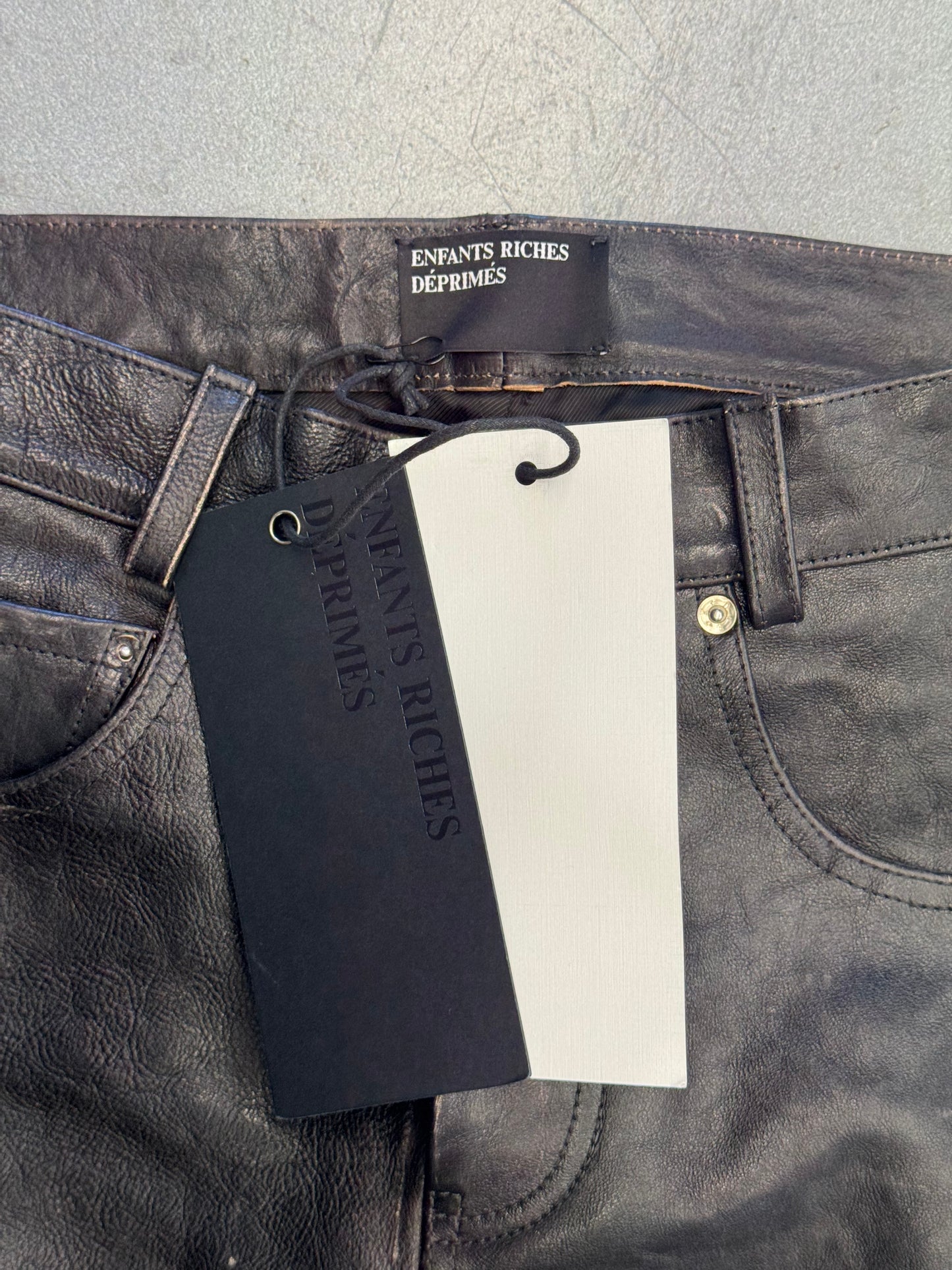 ENFANTS RICHES DEPRIMES ERD CRUST REPAIRED LEATHER FLARE JEANS - NWT