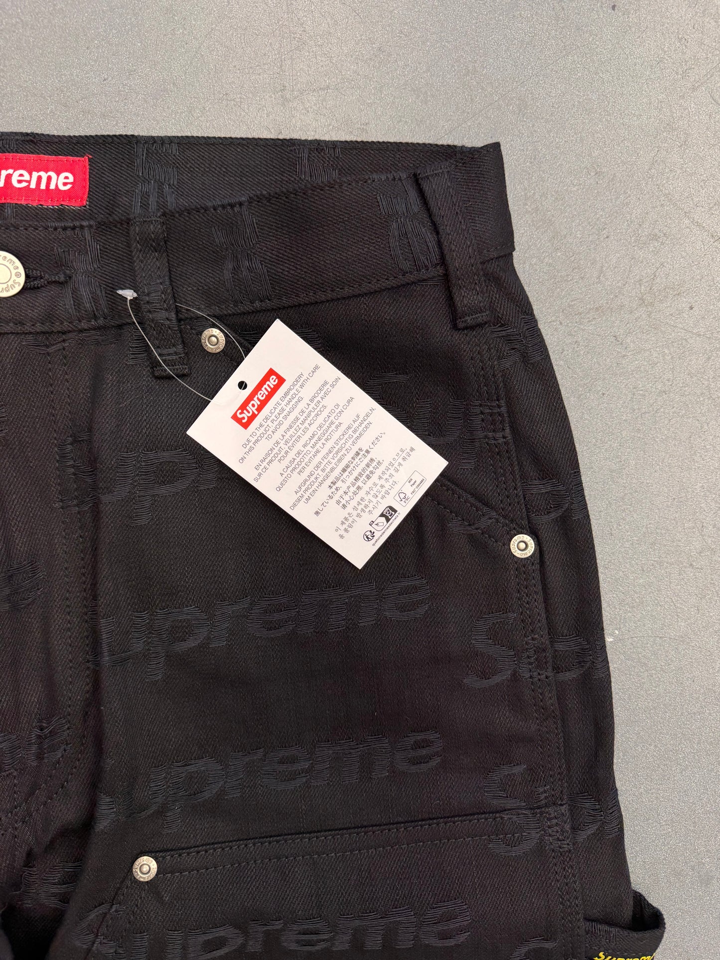 FW25 SUPREME JACQUARD LOGOS DOUBLE KNEE DENIM PAINTER JEAN - BLACK