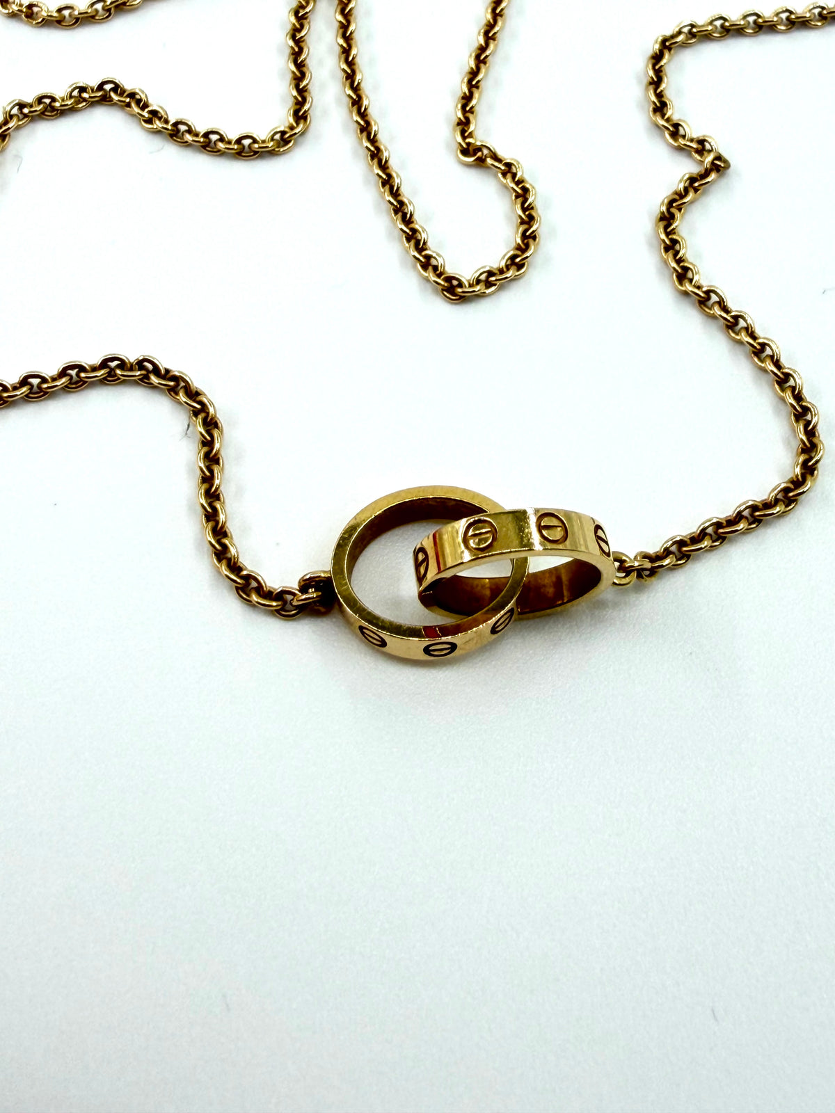 CARTIER 18K YELLOW GOLD LOVE INTERLOCKING TWO-RING NECKLACE