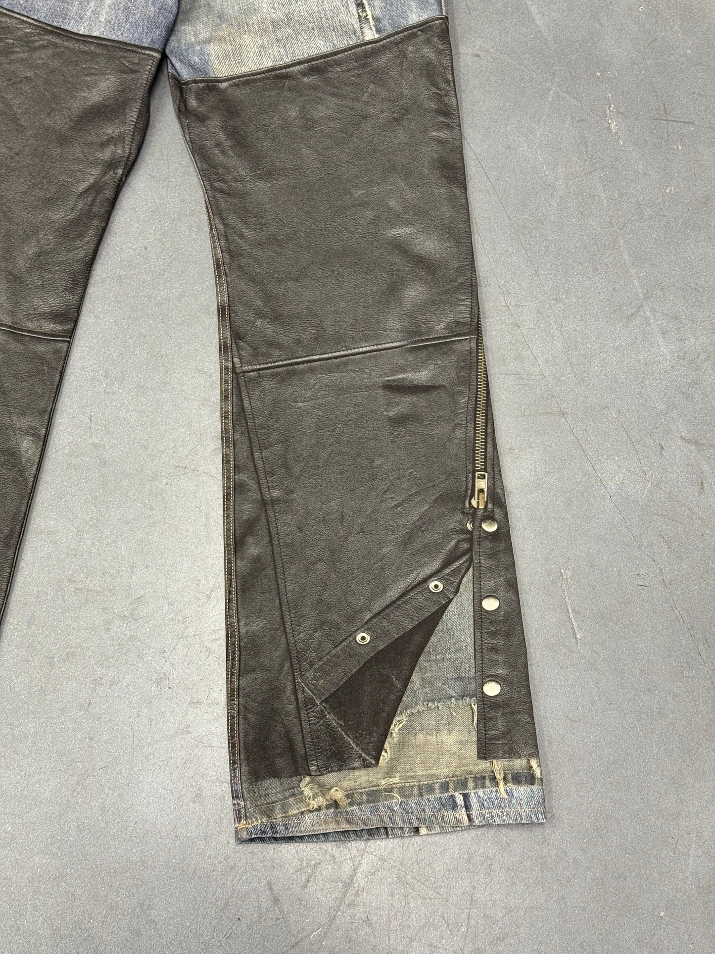 ACNE STUDIOS LEATHER CHAPS PRINTED JEANS